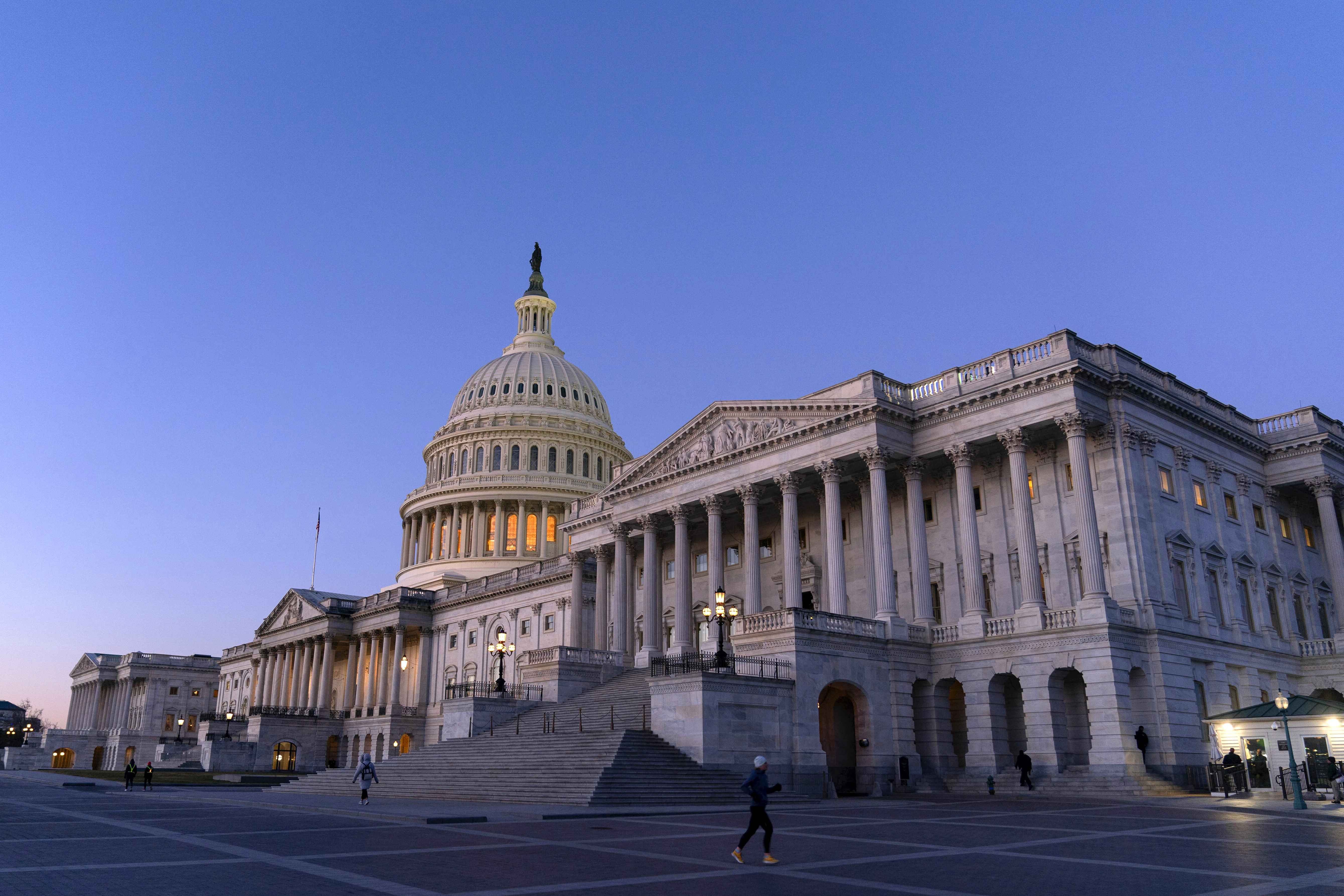 The U.S. Capitol at sunrise, Feb. 7 in Washington. Congress didn't include an expansion of benefits to radiation victims in its recent $1.2 billion spending package, giving lawmakers until June extend the aid before it runs out.