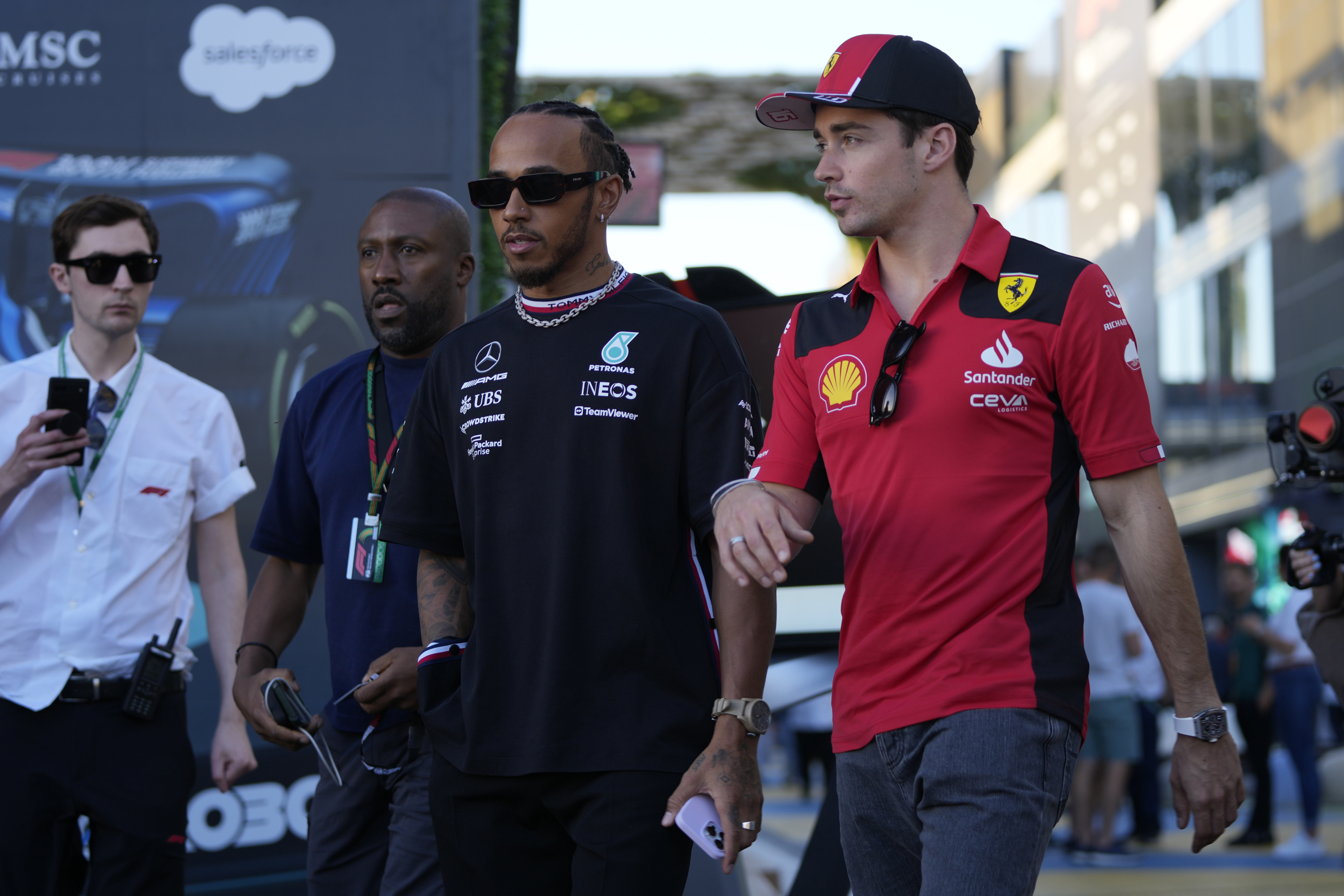 FILE - Mercedes driver Lewis Hamilton of Britain, left, and Ferrari driver Charles Leclerc of Monaco arrive to speak to media ahead of the Formula On Saudi Arabian Grand Prix in Jeddah, Saudi Arabia, Thursday, March 16, 2023. Lewis Hamilton's arrival will present “a huge opportunity” for Ferrari next year but signing the seven-time Formula One champion involved some uncomfortable phone calls, team principal Fred Vasseur said Tuesday, Feb. 13, 2024. Hamilton is joining Ferrari for next season after driving for Mercedes since 2013. He will team up with Charles Leclerc at the Italian team after Carlos Sainz Jr. leaves. 