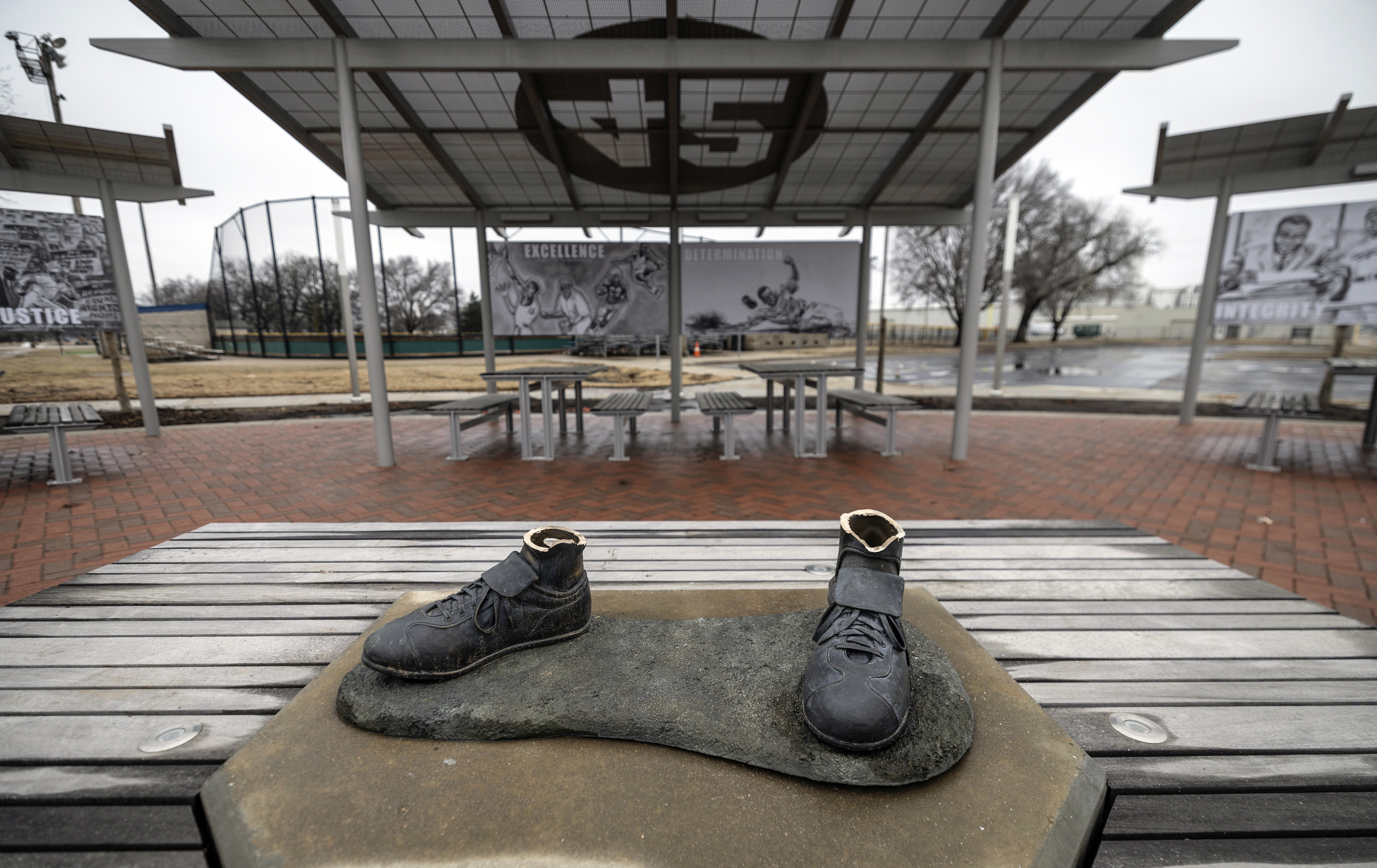 FILE - A bronze statue of legendary baseball pioneer Jackie Robinson was stolen from a park in Wichita, Kan., during the early morning hours of Thursday, Jan. 25, 2024. Police announced Tuesday, Feb. 13, the arrest of a man in the theft of the Jackie Robinson statue that later was found dismantled and burned. 
