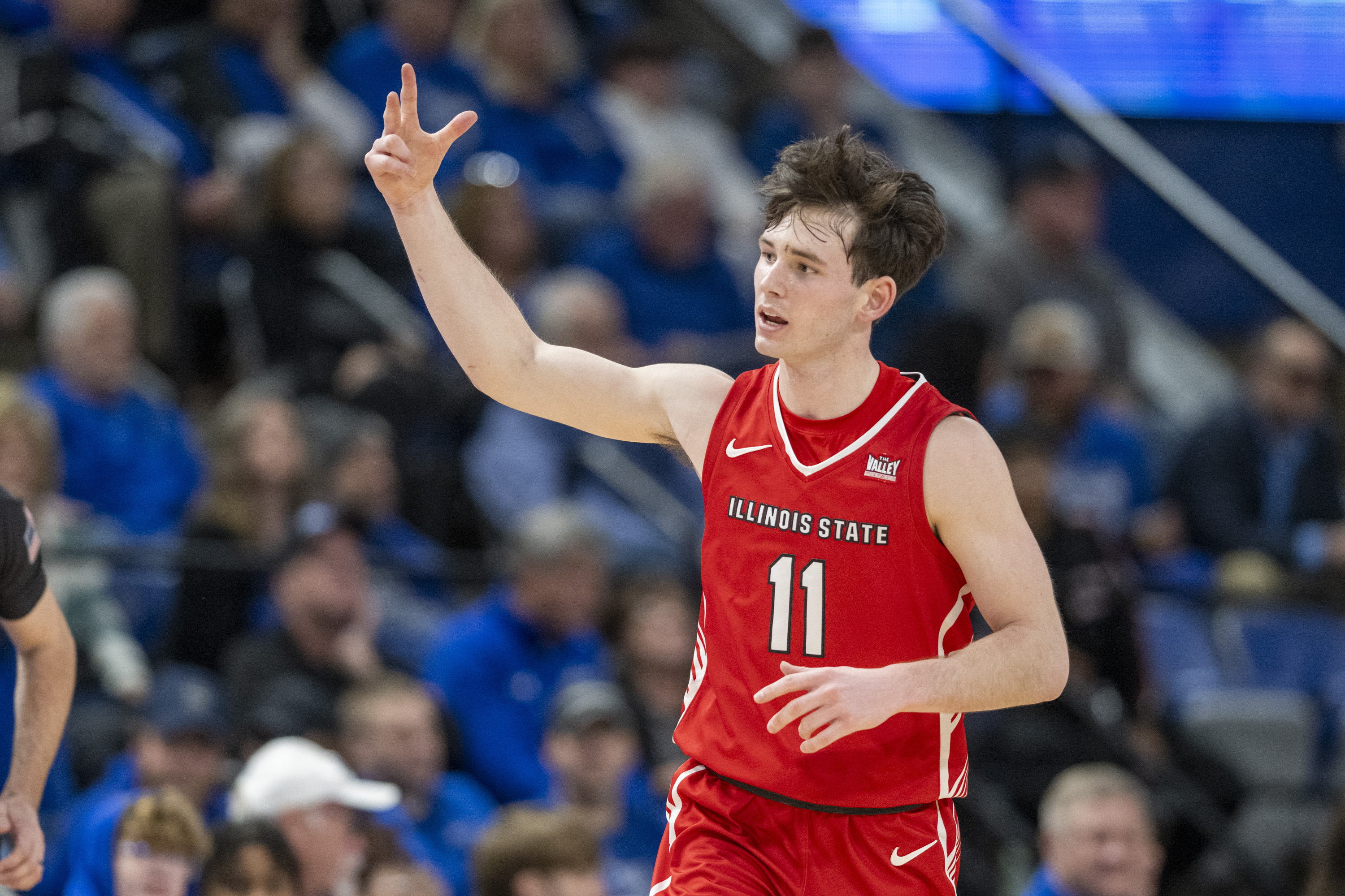 Illinois State guard Johnny Kinziger (11) gestures after scoring a 3-point basket against Indiana State during the second half of an NCAA college basketball game Tuesday, Feb. 13, 2024, in Terre Haute, Ind. 