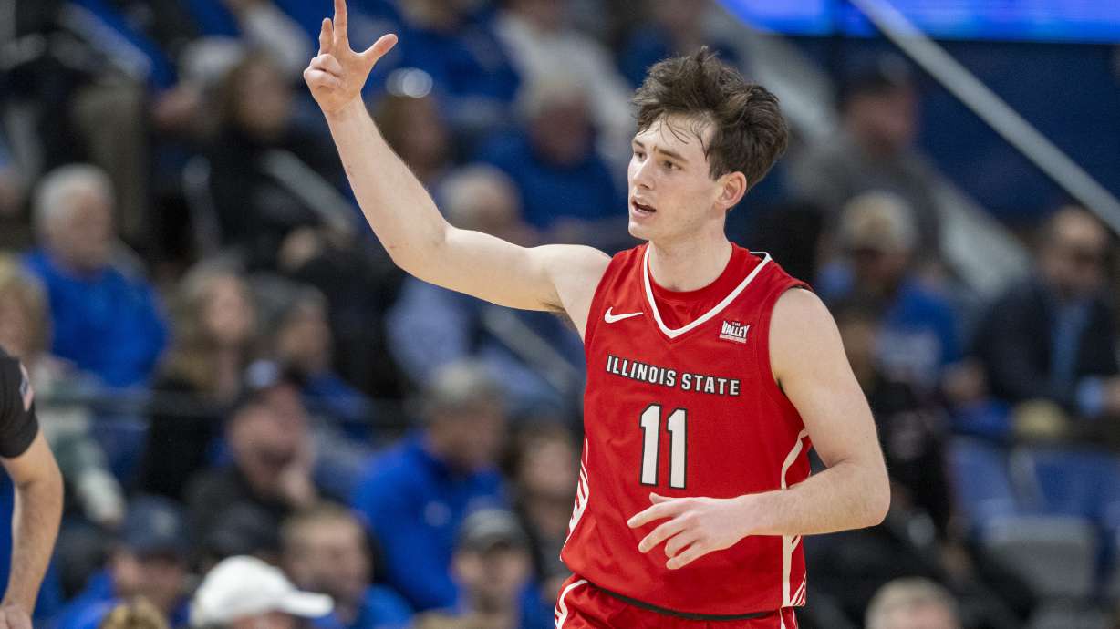Illinois State guard Johnny Kinziger (11) gestures after scoring a 3-point basket against Indiana State during the second half of an NCAA college basketball game Tuesday, Feb. 13, 2024, in Terre Haute, Ind.