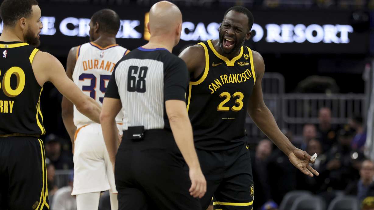 Golden State Warriors forward Draymond Green (23) argues with a referee after receiving a technical foul during the second half of an NBA basketball against the Phoenix Suns game in San Francisco, Saturday, Feb. 10, 2024.