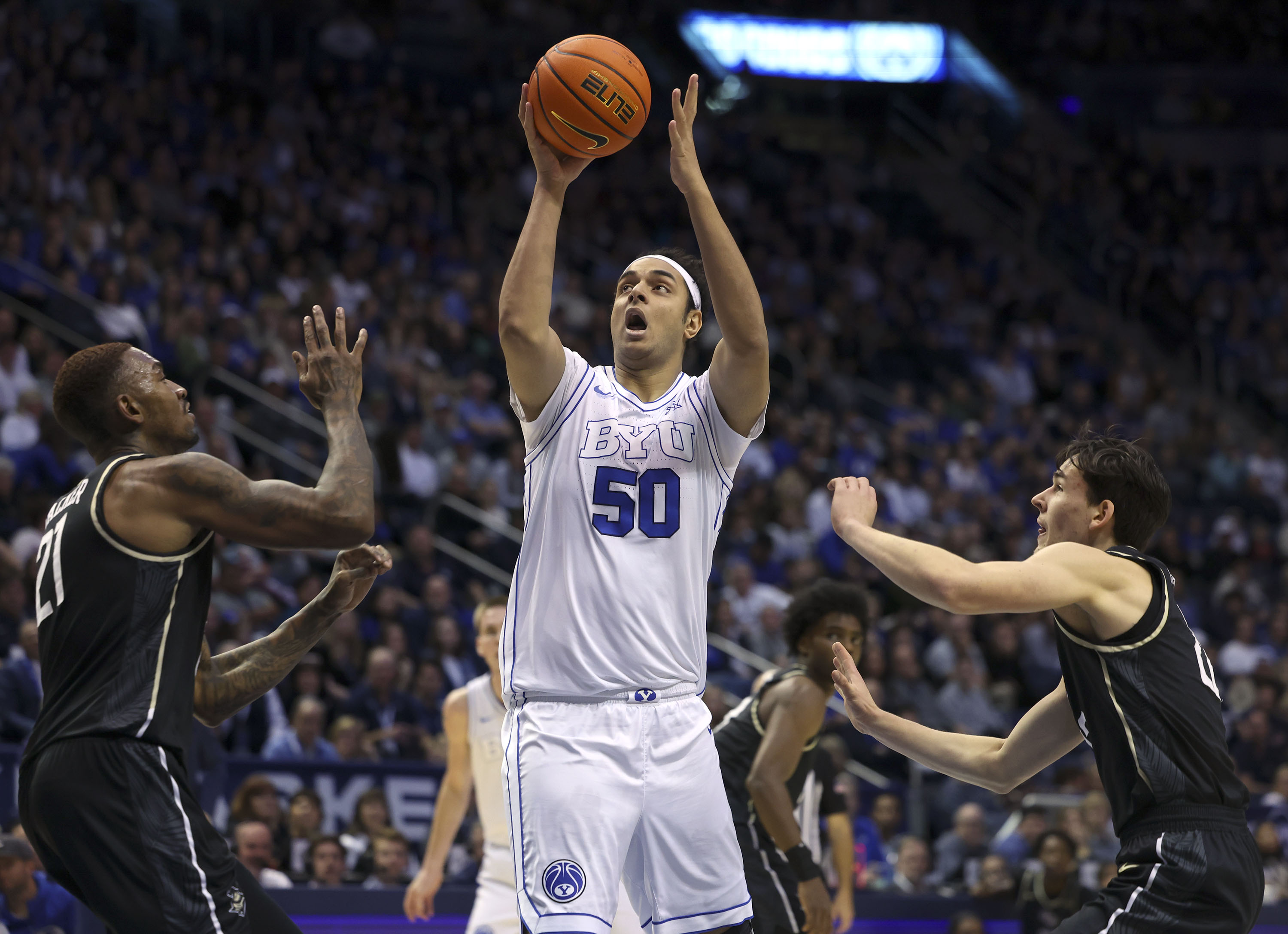 Brigham Young center Aly Khalifa (50) shoots against the UCF Knights at the Marriott Center in Provo on Tuesday, Feb. 13, 2024.