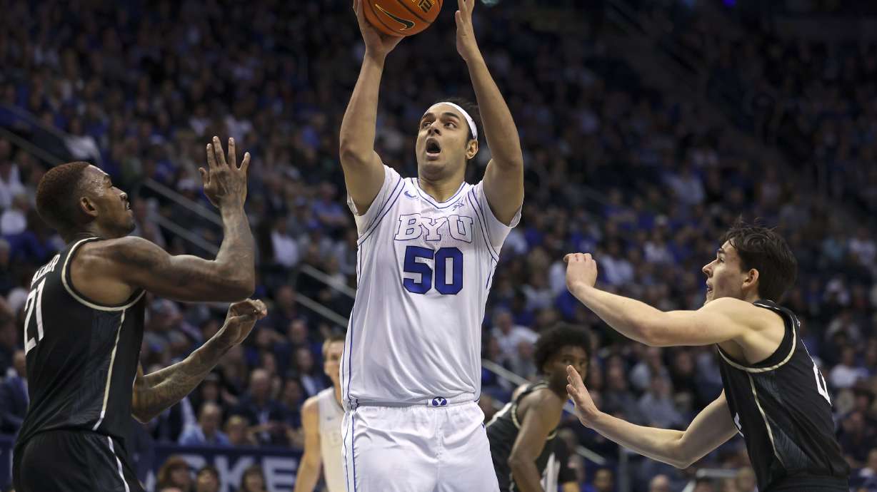 Brigham Young center Aly Khalifa (50) shoots against the UCF Knights at the Marriott Center in Provo on Tuesday, Feb. 13, 2024.