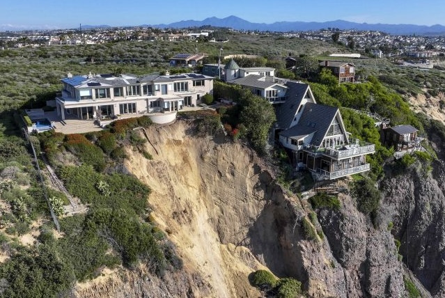 The three homes affected by the recent deluge of rain in California are being monitored but don't appear to be in imminent danger, county officials said. 