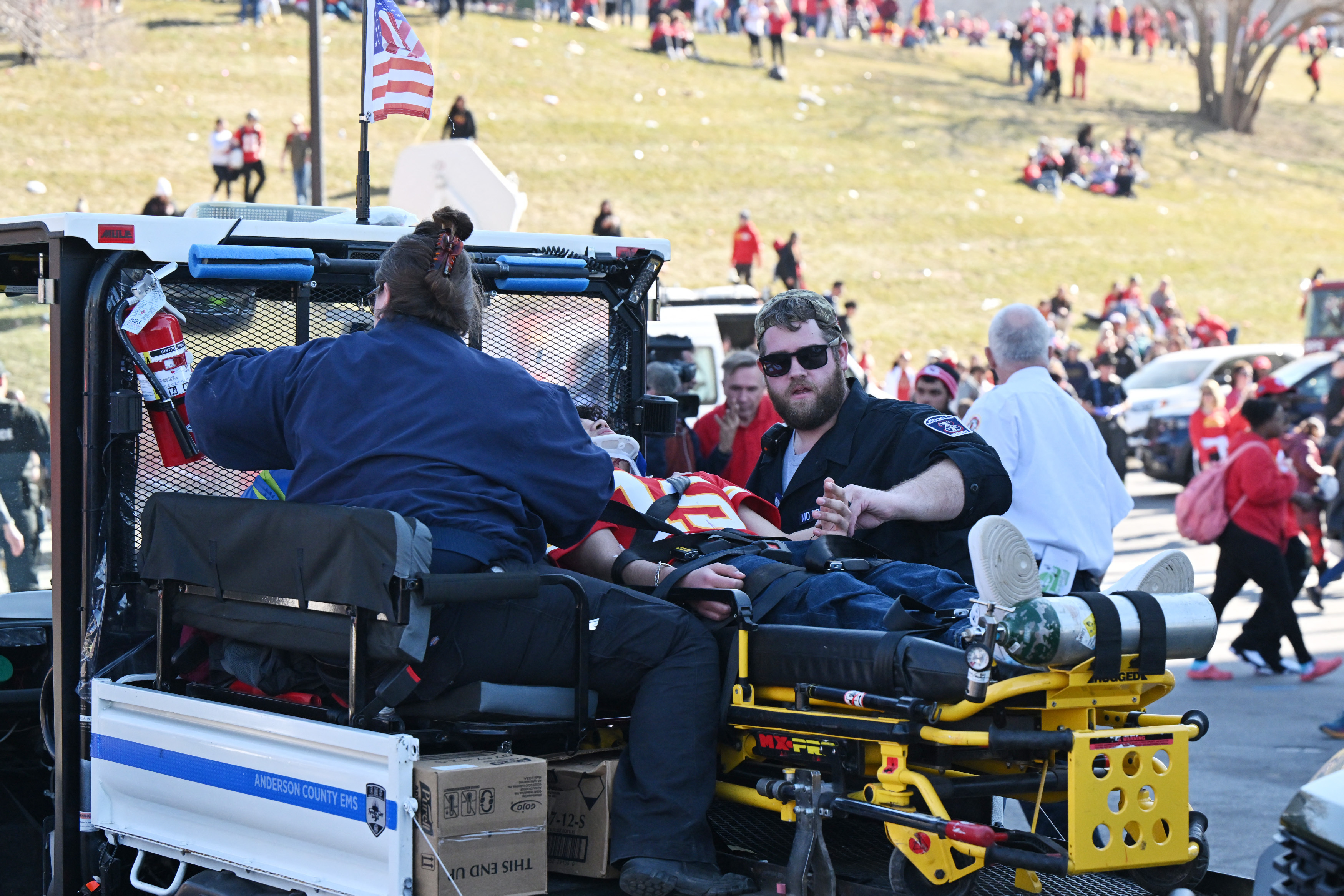 Fans receive medical assistance after gunshots were fired after the celebration of the Kansas City Chiefs winning Super Bowl LVIII, Kansas City, Mo., Wednesday.