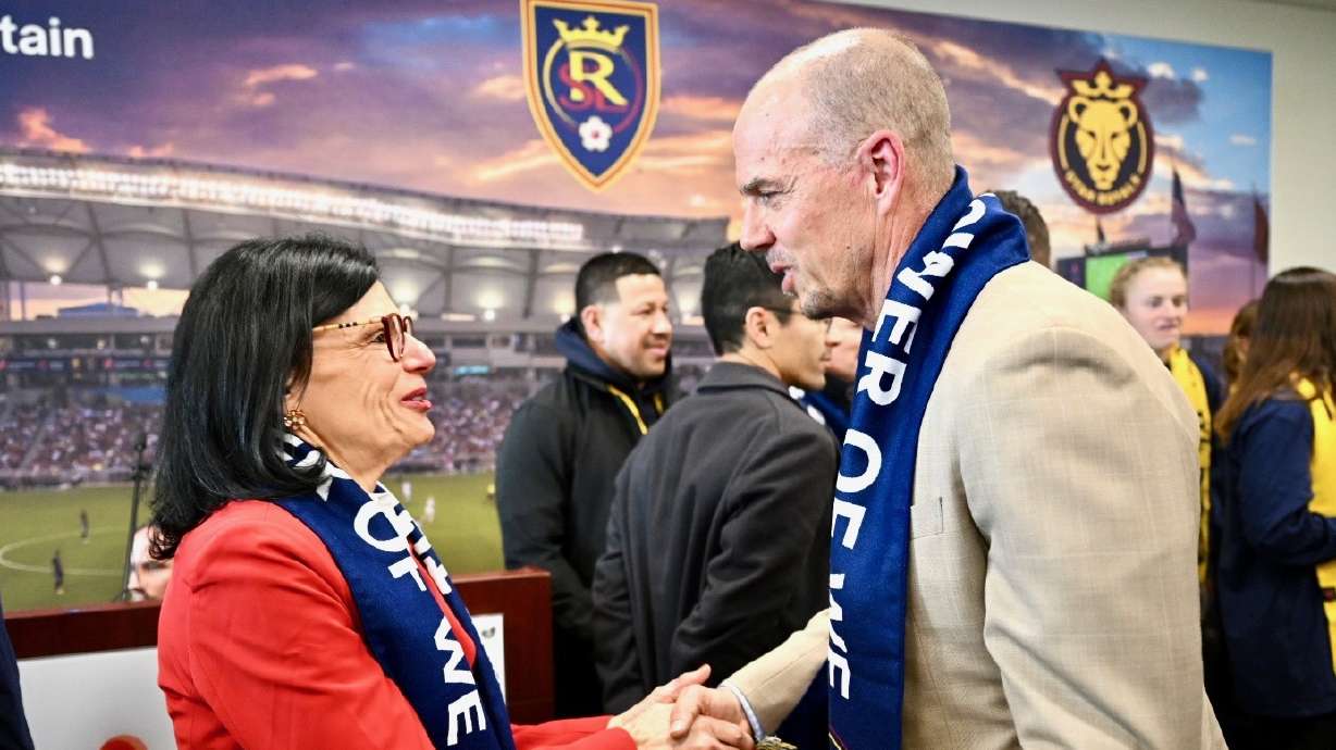 Sue Robel, president of the Intermountain Health canyons region shakes hands with Real Salt Lake President John Kimball after an announcement that Intermountain Health will be the health provider for Real Salt Lake, the Utah Royals and their affiliate teams, during a press conference at Primary Children’s Hospital on Wednesday.