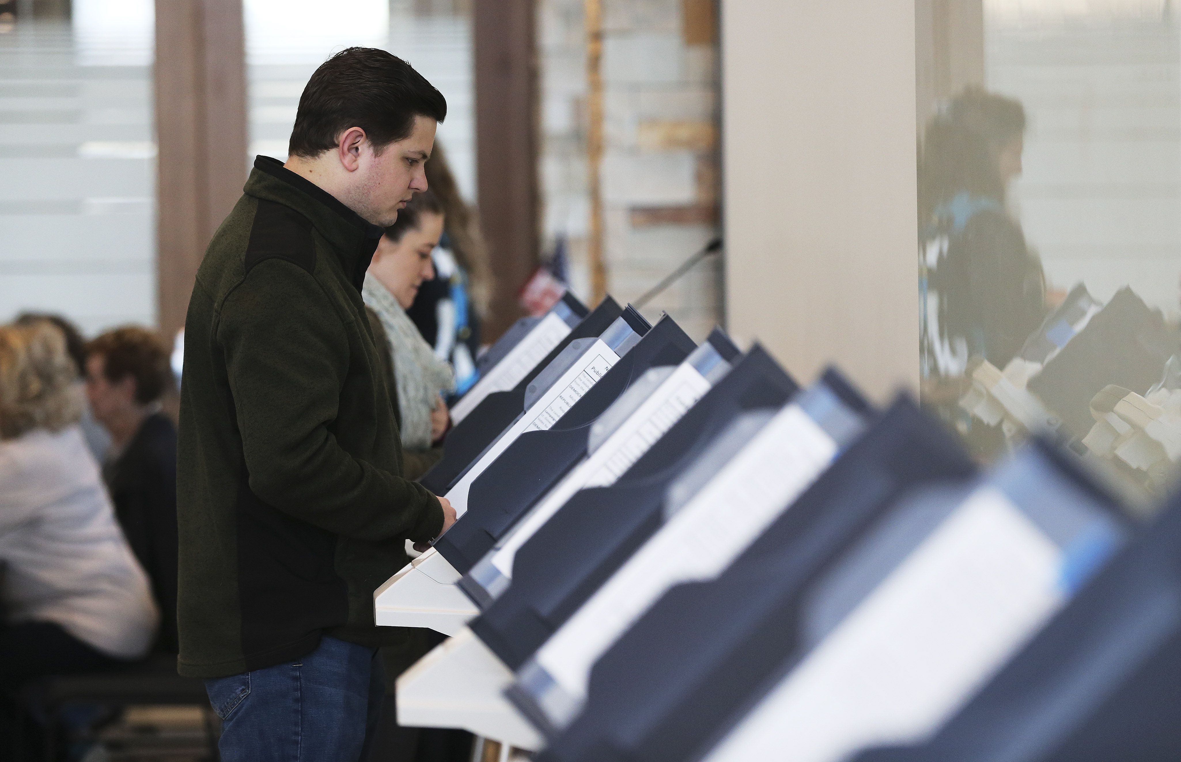Zachery Prince votes at Cottonwood Heights City Hall in Cottonwood Heights on March 3, 2020. Utah’s GOP opted out of the primary in favor of a presidential preference vote at caucus meetings.