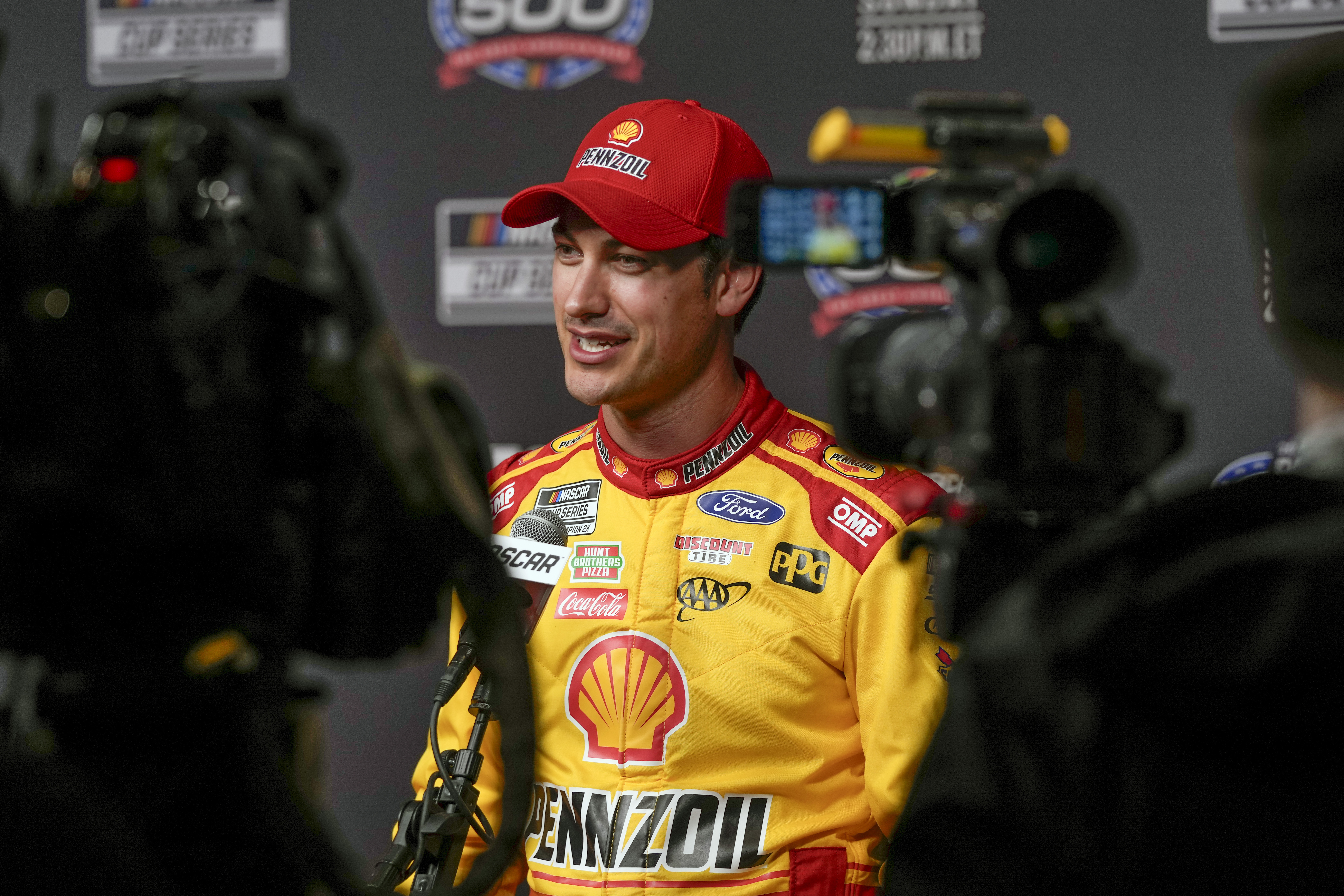 Joey Logano talks to members of the media during NASCAR Daytona 500 auto racing media day at Daytona International Speedway, Wednesday, Feb. 14, 2024, in Daytona Beach, Fla.