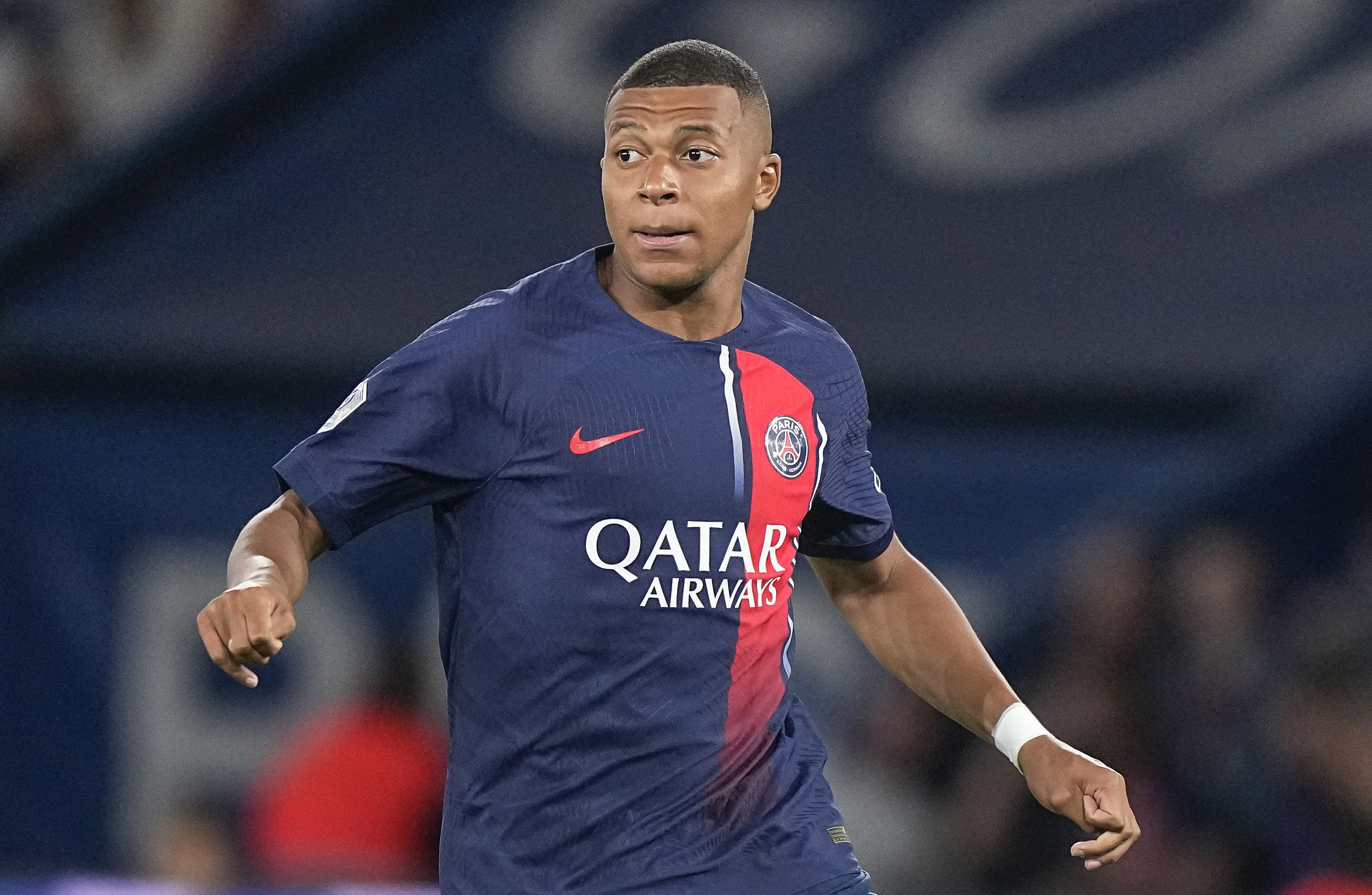 FILE - PSG's Kylian Mbappe looks on during the French League One soccer match between Paris Saint-Germain and Lens at the Parc des Princes stadium in Paris, Saturday, Aug. 26, 2023. Mbappe has told Paris Saint-Germain he will leave the club at the end of the season, it was reported on Thursday, Feb. 15, 2024. 