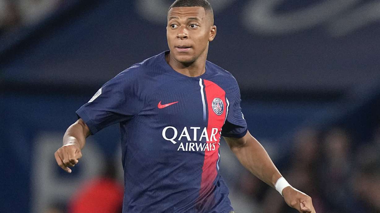 FILE - PSG's Kylian Mbappe looks on during the French League One soccer match between Paris Saint-Germain and Lens at the Parc des Princes stadium in Paris, Saturday, Aug. 26, 2023. Mbappe has told Paris Saint-Germain he will leave the club at the end of the season, it was reported on Thursday, Feb. 15, 2024.
