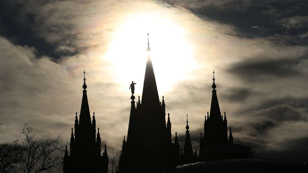 The Salt Lake Temple is surrounded by rain clouds during the 189th Annual General Conference of The Church of Jesus Christ of Latter-day Saints in Salt Lake City on April 6, 2019.