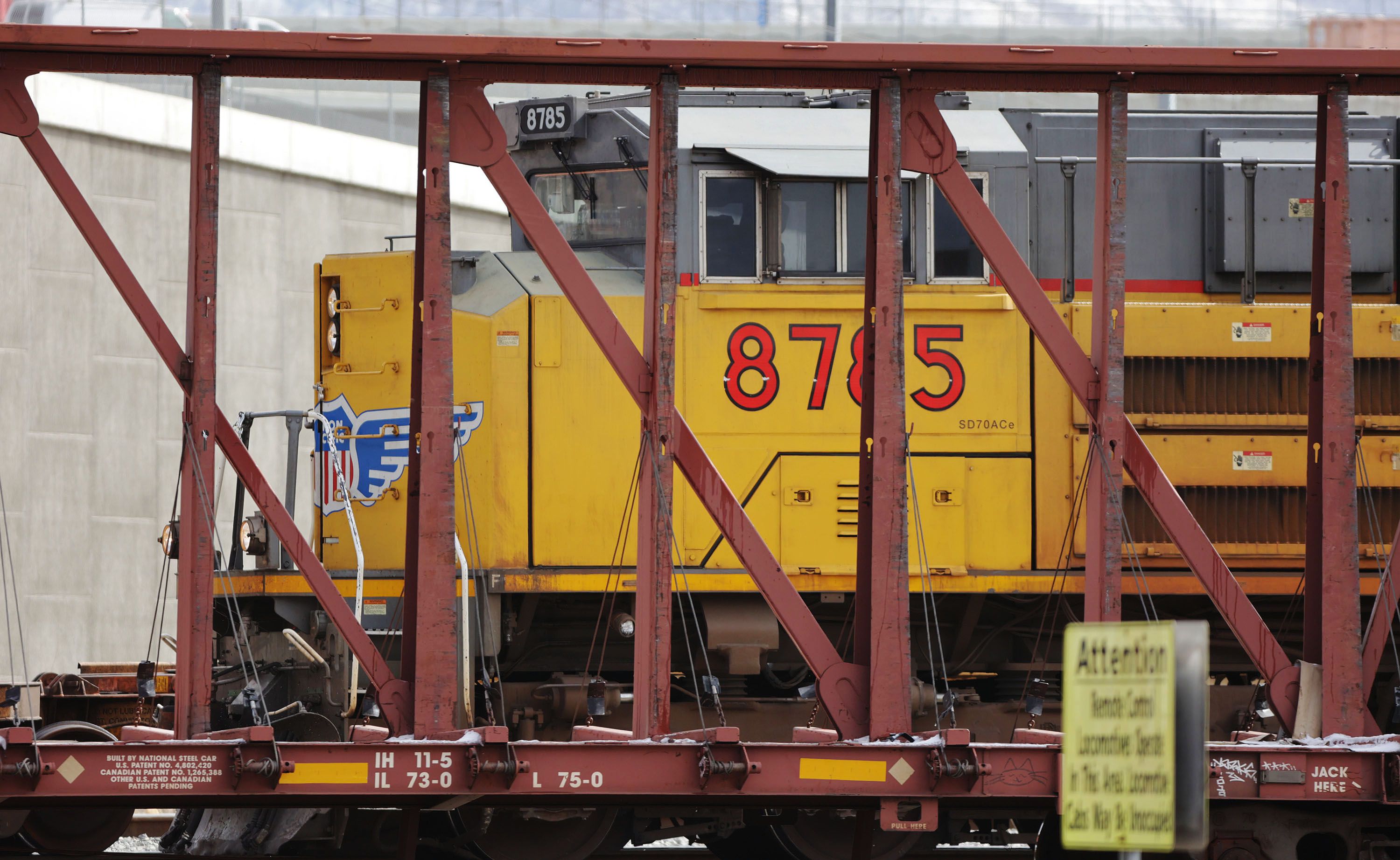 An engine pulls cars at the Union Pacific Roper yard in South Salt Lake on Feb. 22, 2022. Industries making investments in energy infrastructure to expand under a proposal that received endorsement from a legislative committee on Thursday.