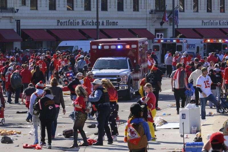 Police clear the area following a shooting at the Kansas City Chiefs NFL football Super Bowl celebration in Kansas City, Mo., Wednesday. Multiple people were injured, a fire official said.