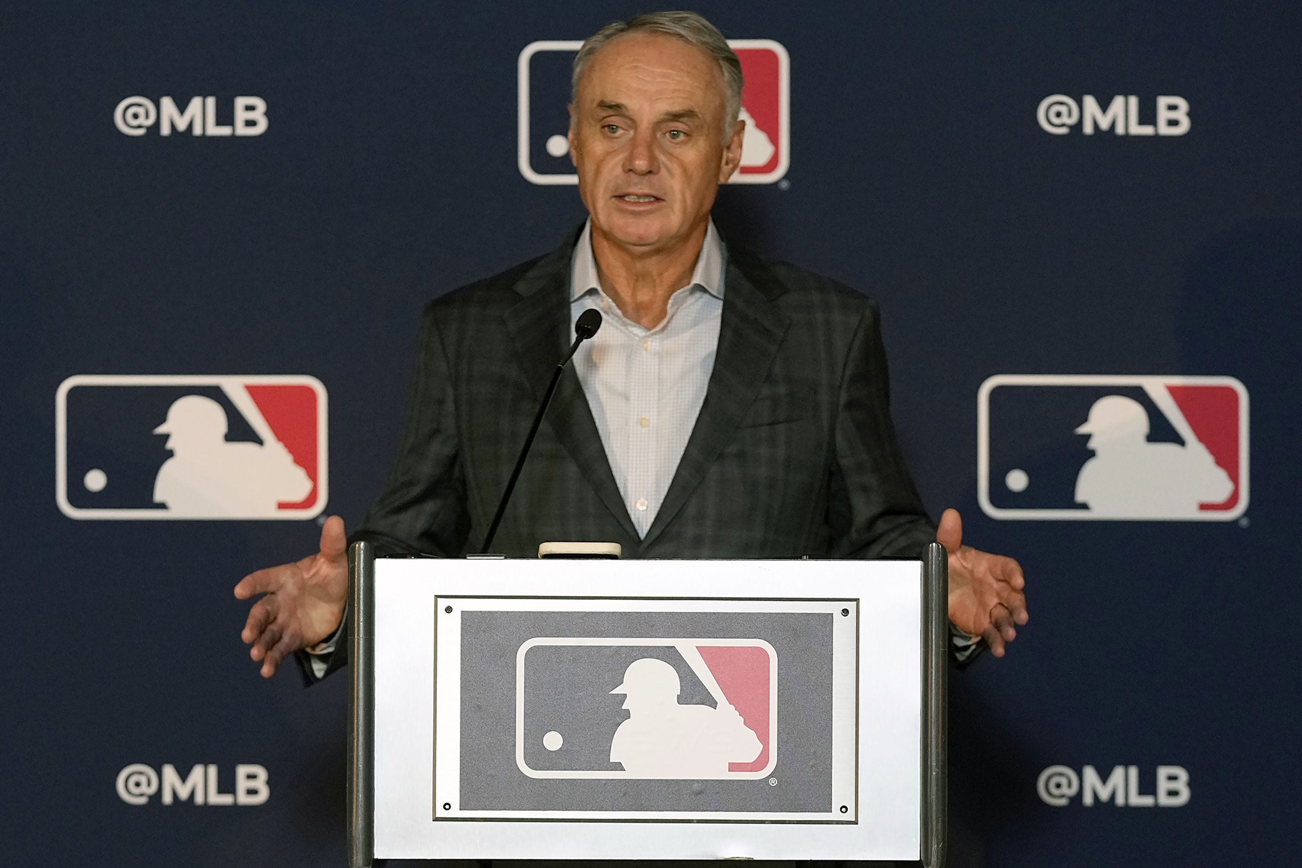 FILE - Major League Baseball commissioner Rob Manfred speaks during a news conference after an owners meeting in Arlington, Texas, Thursday, Nov. 16, 2023. MLB commissioner Rob Manfred said he would be disappointed if the Oakland Athletics don't open their proposed Las Vegas ballpark at the start of the 2028 season and expressed skepticism about big leaguers appearing in that year's Olympics, during a news conference following an owners meeting in Orlando, Fla., Thursday Feb. 8, 2024.