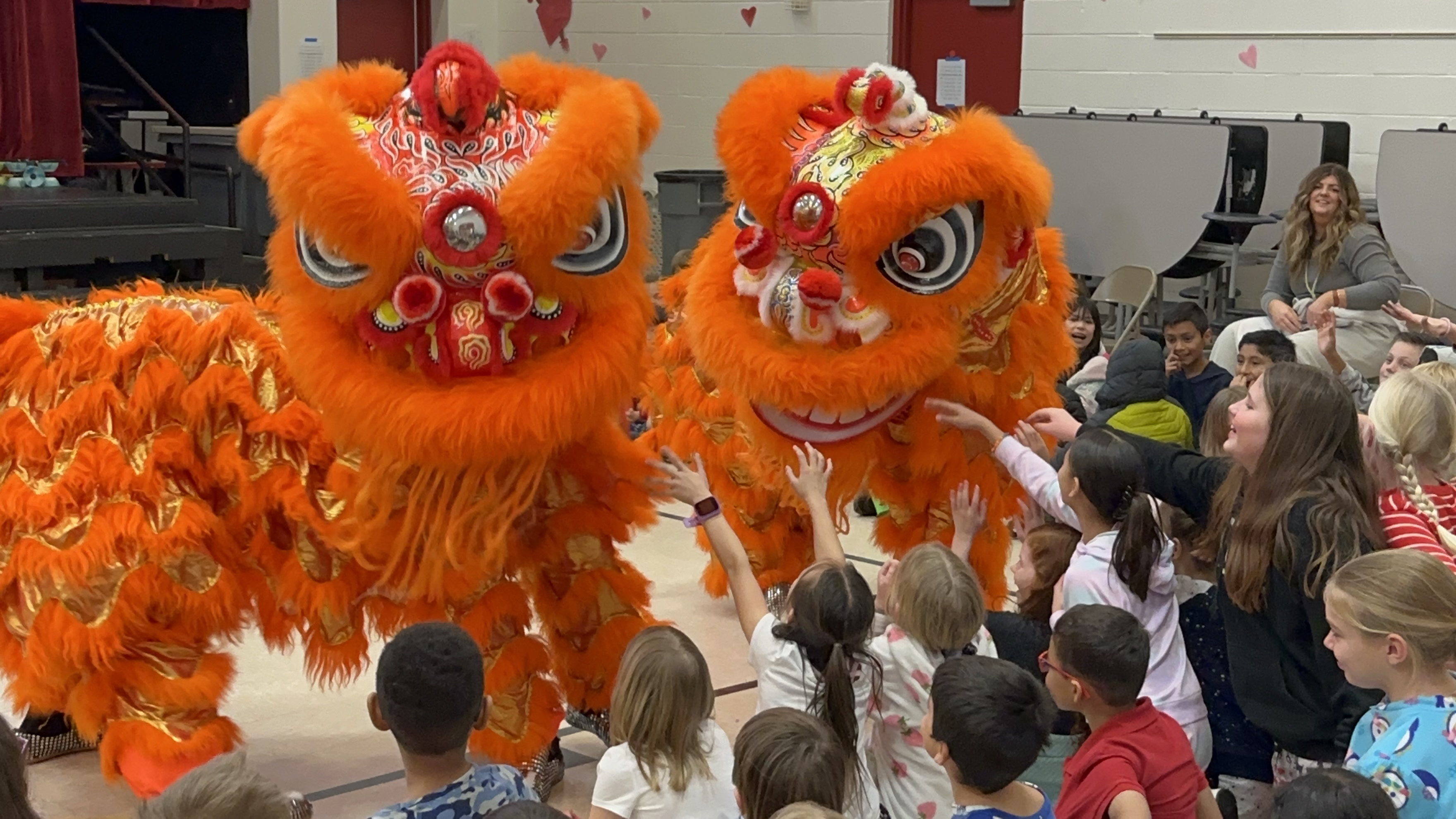 Students at Renaissance Academy in Lehi watch a lion dance performance on Feb. 6, put on by the An-Ping Sword, Lion and Drum Team of Taiwan. The Provo-based Su Ma Ma Chinese Club hosted the An-Ping group. 
