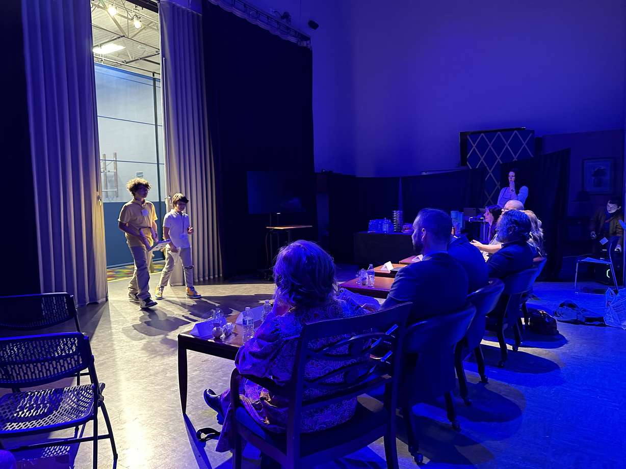 Franklin Discovery Academy students enter the shark tank to present their product idea to local business owners during a "Shark Tank" entrepreneurial experience on Wednesday.