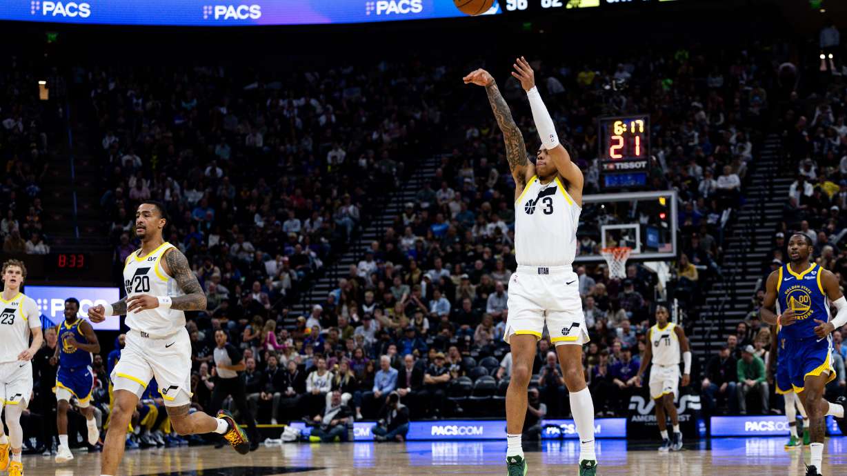 Utah Jazz guard Keyonte George (3) shoots a 3-point basket during the NBA basketball game between the Utah Jazz and the Golden State Warriors at the Delta Center in Salt Lake City on Thursday, Feb. 15, 2024.