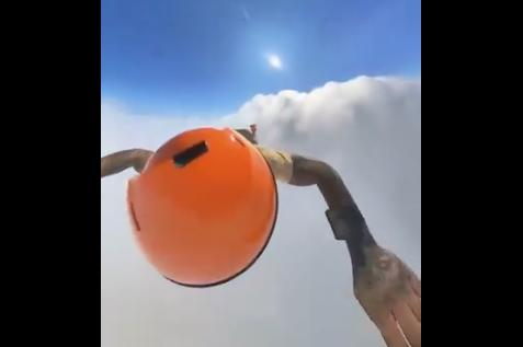 A skydiver recorded himself at around 15,000 feet of altitude over Girona, Spain, free-falling through clouds before opening his parachute.