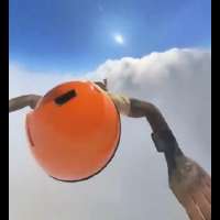 Have You Seen This? Skydiver falls through rain cloud