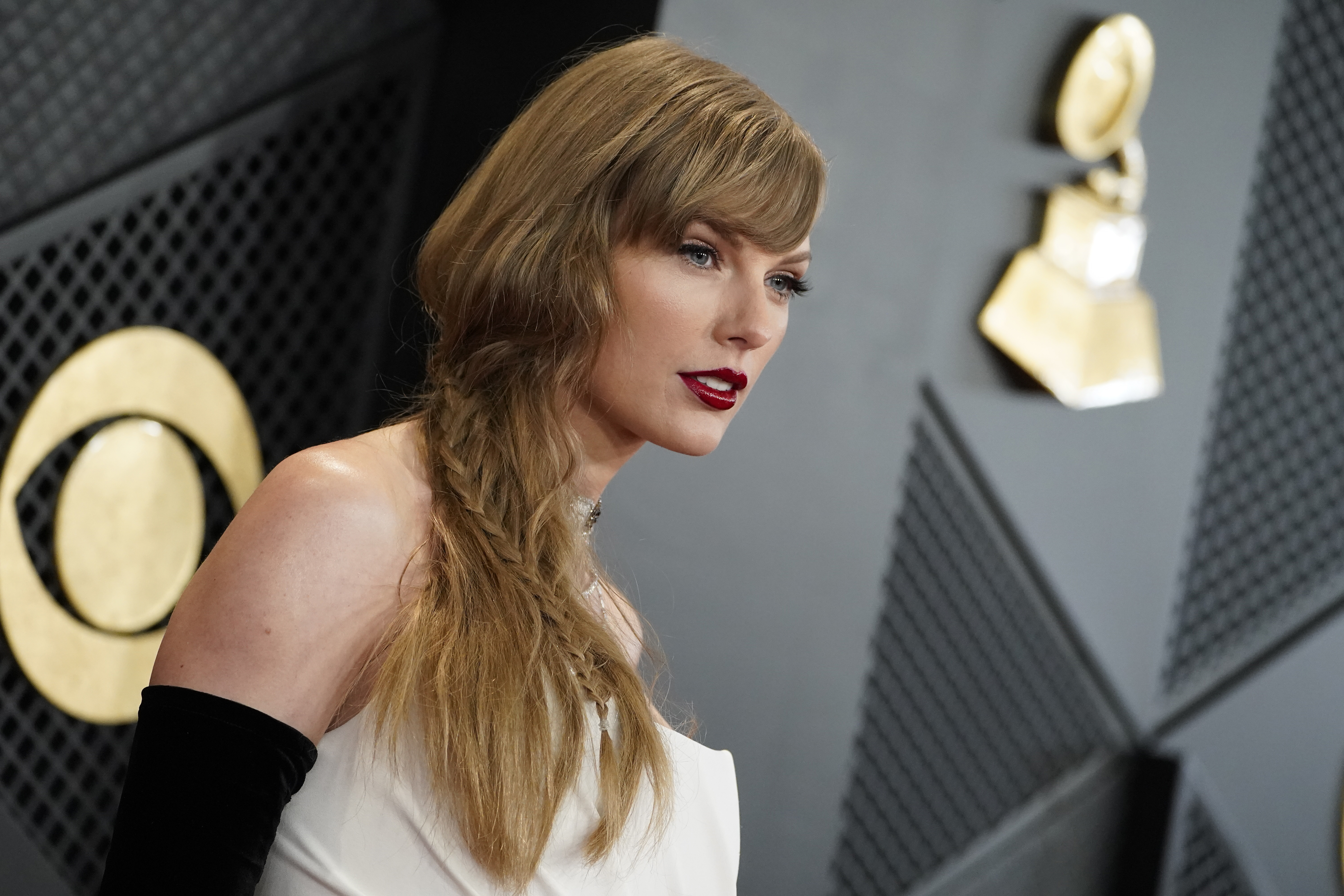 Taylor Swift arrives at the 66th annual Grammy Awards on Feb. 4, in Los Angeles. Taylor Swift has donated $100,000 to the family of Lisa Lopez-Galvan, the woman killed in the shooting at the Kansas City Chiefs' Super Bowl victory parade. 