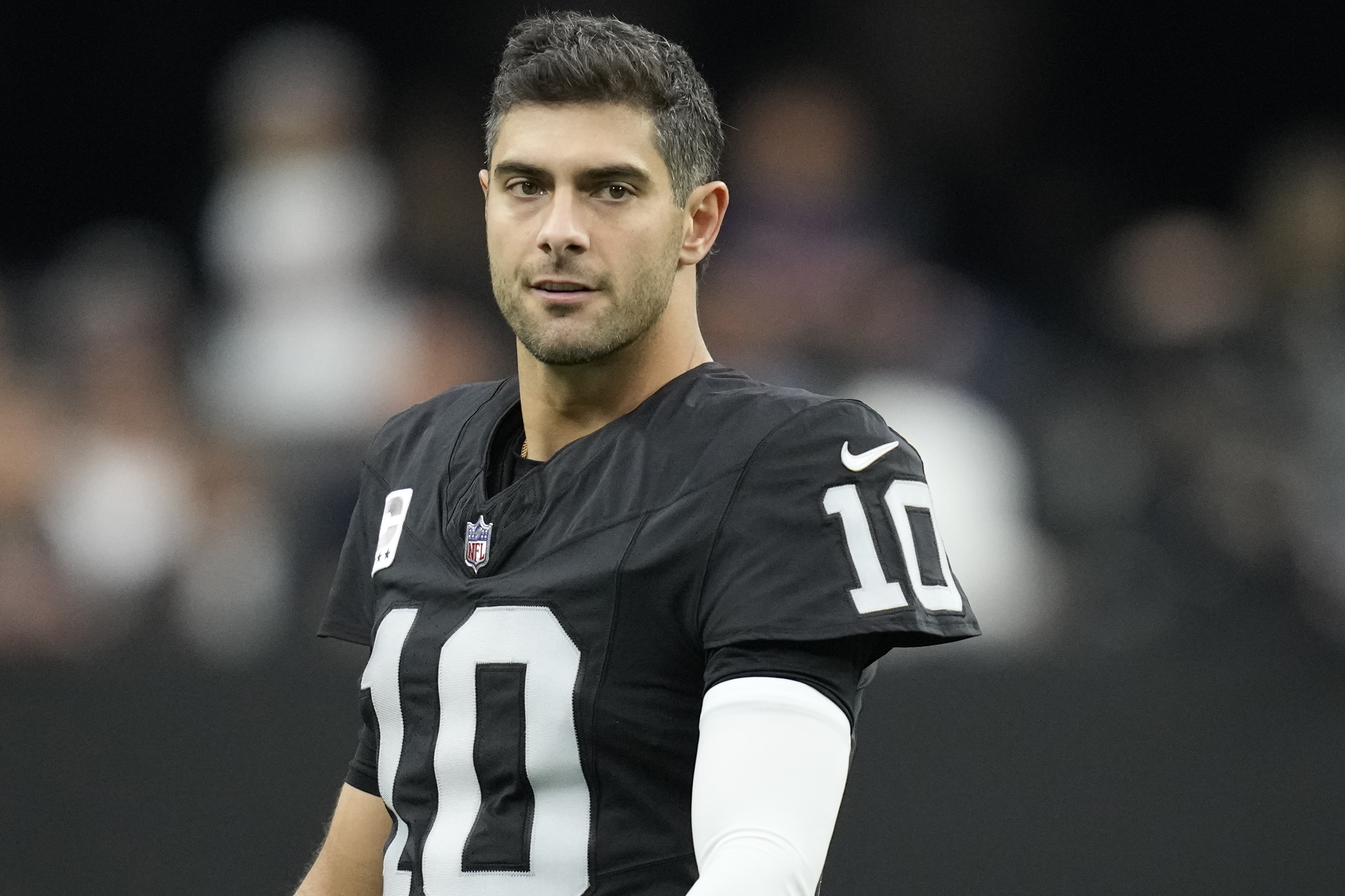 FILE - Las Vegas Raiders quarterback Jimmy Garoppolo (10) is shown before an NFL football game against the Denver Broncos, Sunday, Jan. 7, 2024, in Las Vegas. The NFL announced Friday, Feb. 16, that Raiders quarterback Jimmy Garoppolo was suspended for the first two games of next season for violating performance-enhancing drugs policy of the league and NFL Players Association.