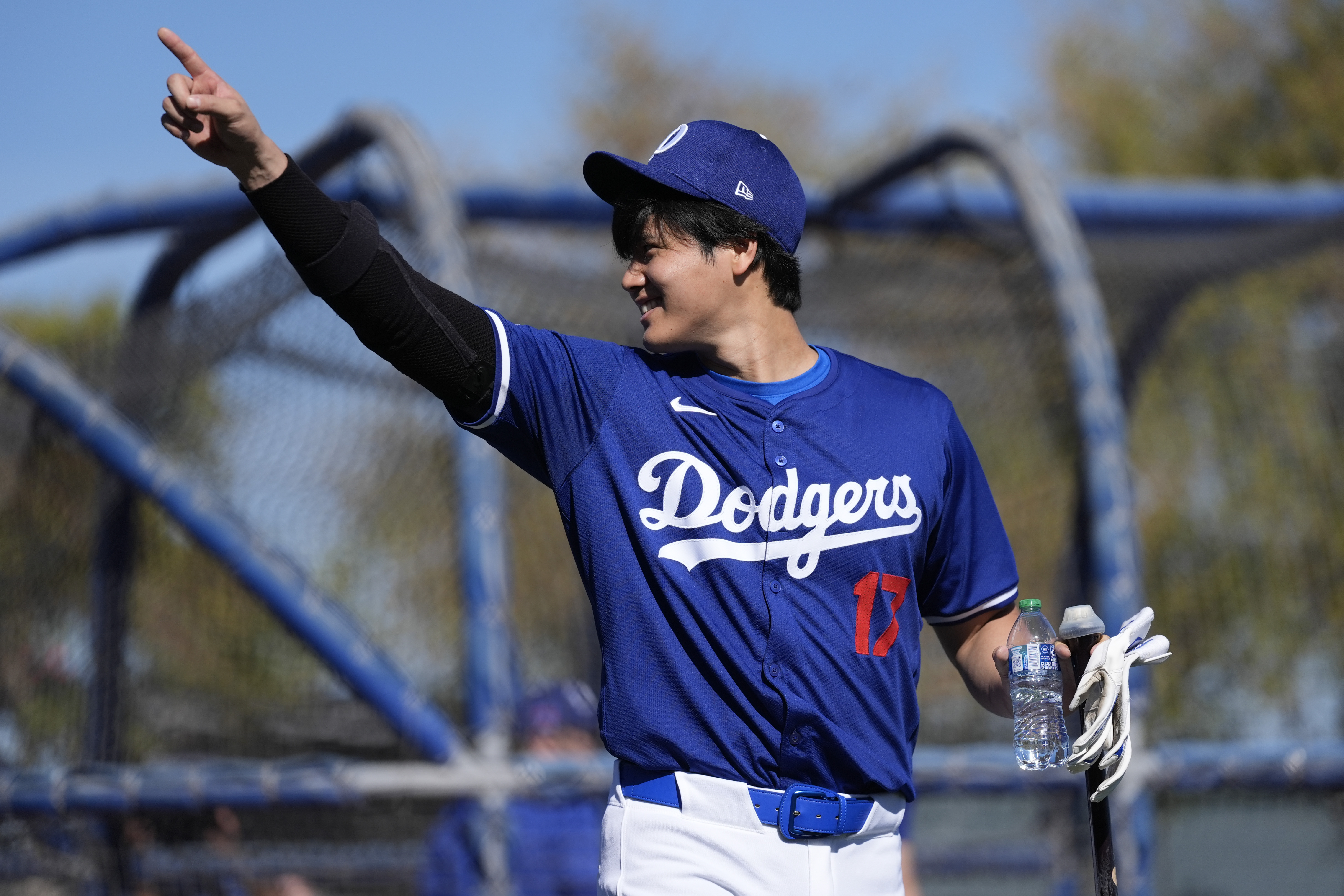 Los Angeles Dodgers designated hitter Shohei Ohtani (17) participates in spring training baseball workouts at Camelback Ranch in Phoenix, Friday, Feb. 16, 2024. 