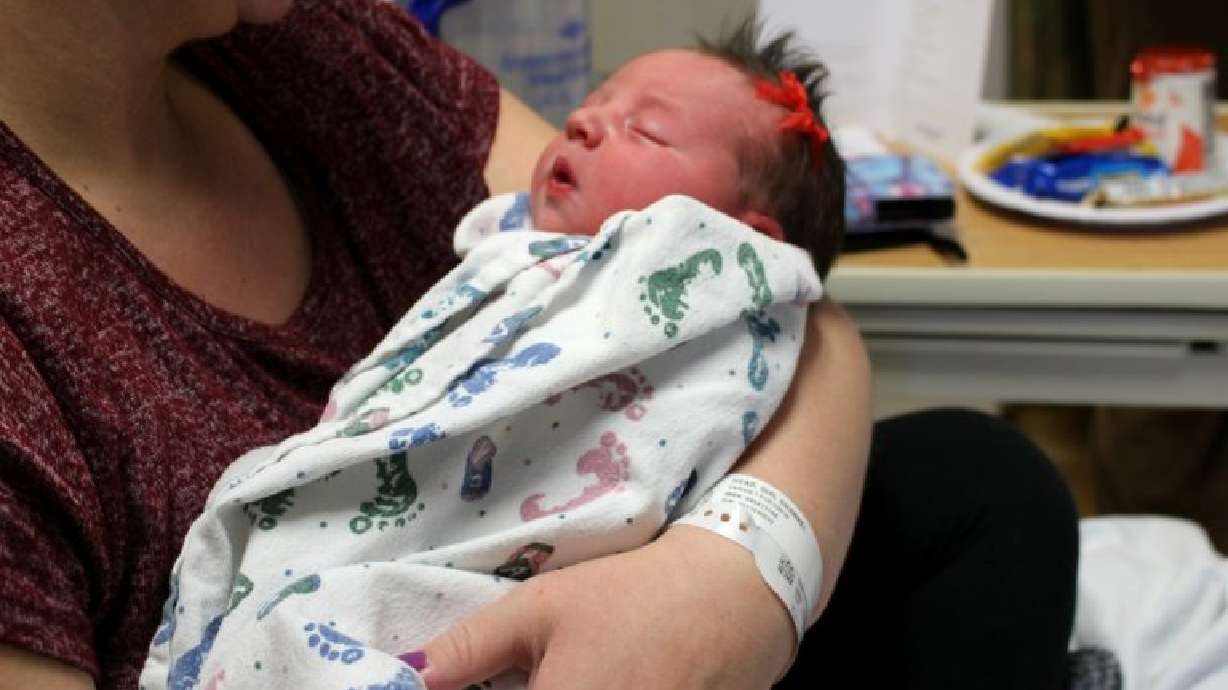 A newborn baby is held at St. George Regional Hospital’s 400 East campus, St. George, Jan. 1, 2018. The hospitals in St. George and Cedar City have gained national recognition.