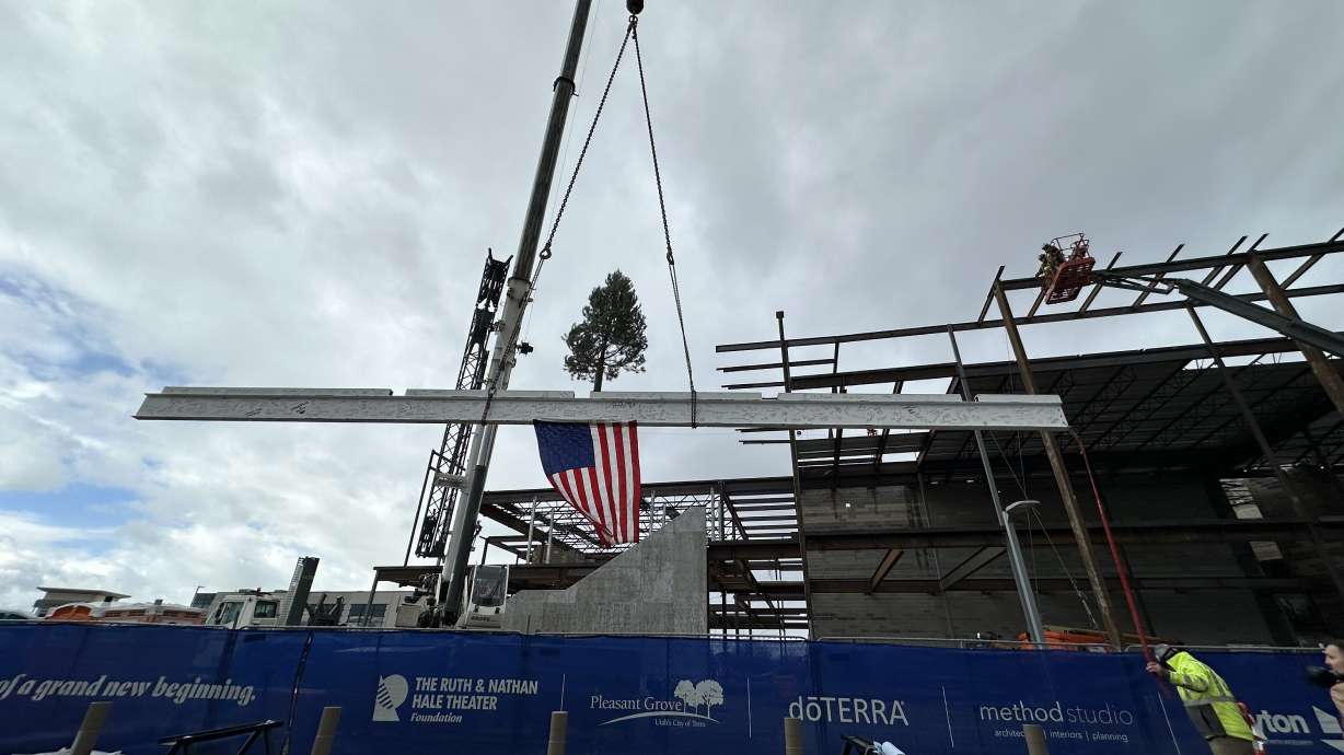 Actors, construction workers and appreciators of the theater celebrated a milestone of construction during a beam-raising ceremony for the Ruth and Nathan Hale Theater in Pleasant Grove on Thursday.