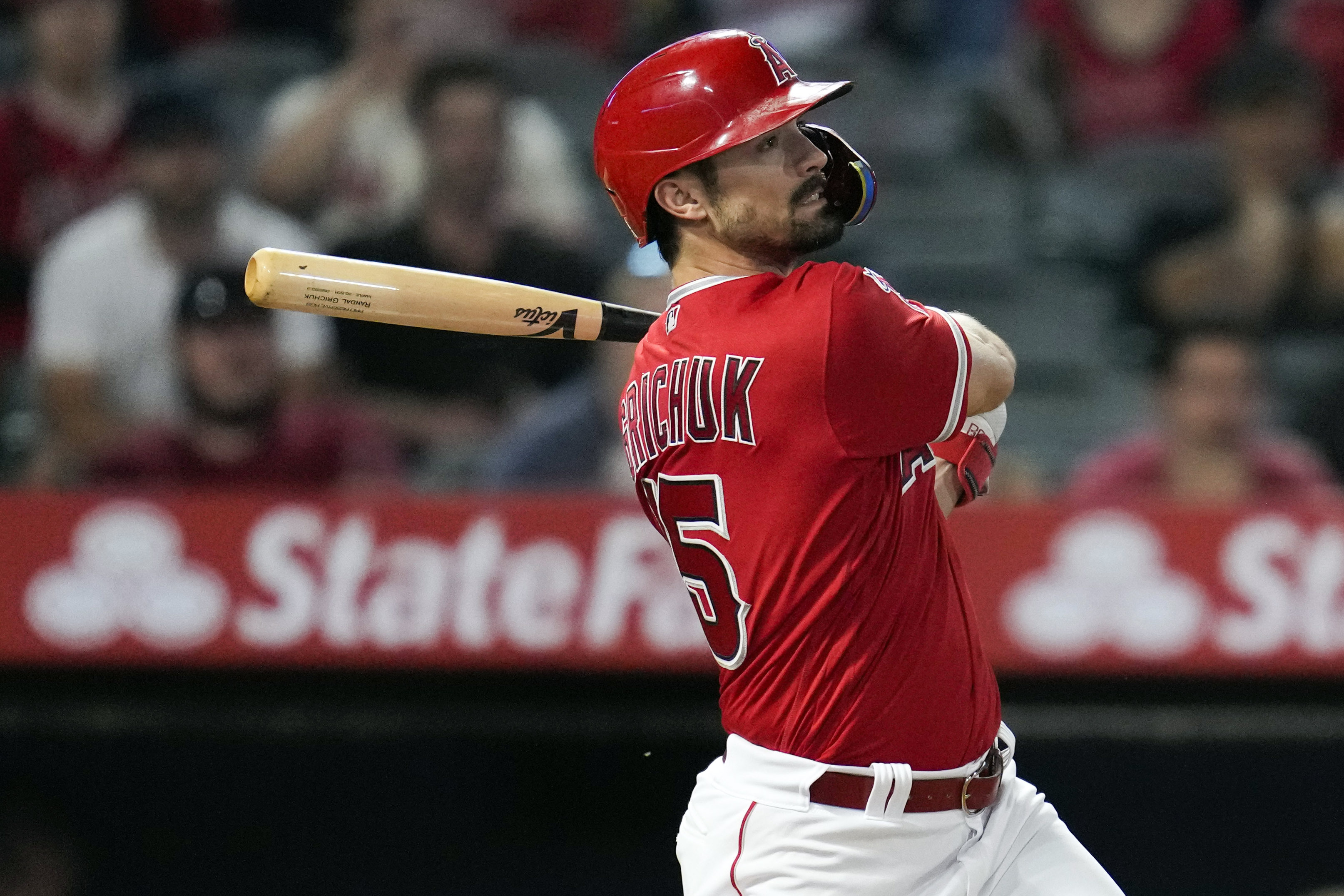 FILE - Los Angeles Angels' Randal Grichuk drives in the winning run with an RBI single against the Cleveland Guardians in a baseball game in Anaheim, Calif., Thursday, Sept. 7, 2023. The Arizona Diamondbacks and veteran slugger Randal Grichuk agreed Saturday, Feb. 17, 2024, on a $2 million, one-year contract with a mutual option for 2025, a person with direct knowledge of the deal told The Associated Press. 