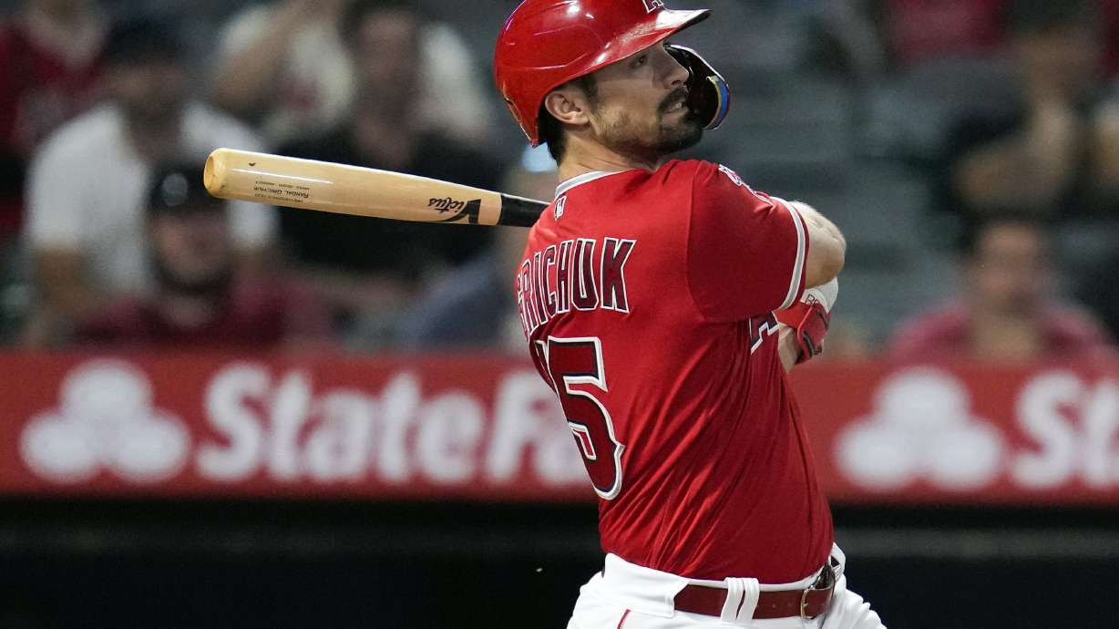 FILE - Los Angeles Angels' Randal Grichuk drives in the winning run with an RBI single against the Cleveland Guardians in a baseball game in Anaheim, Calif., Thursday, Sept. 7, 2023. The Arizona Diamondbacks and veteran slugger Randal Grichuk agreed Saturday, Feb. 17, 2024, on a $2 million, one-year contract with a mutual option for 2025, a person with direct knowledge of the deal told The Associated Press.