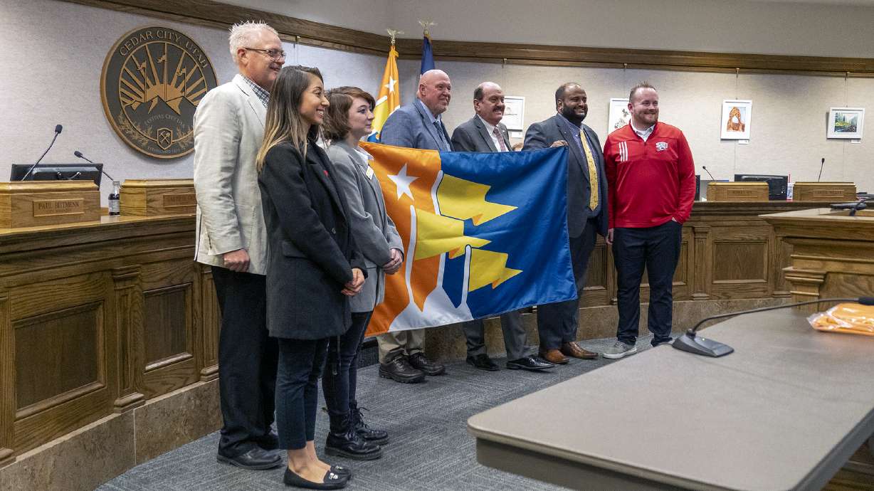 Cedar City government leaders and flag designer Kenten Pope helped unveil Cedar City’s new flag on Wednesday.