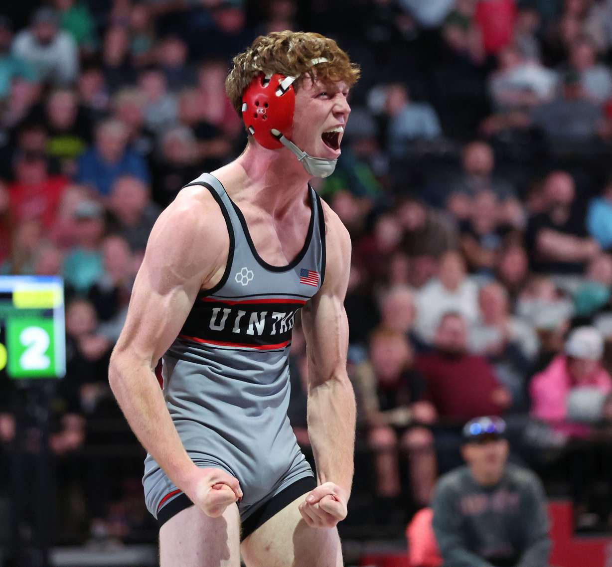 Uintah's Brody Rhoades celebrates in the 4A boys wrestling state championships at UVU in Orem on Saturday, Feb. 17, 2024.