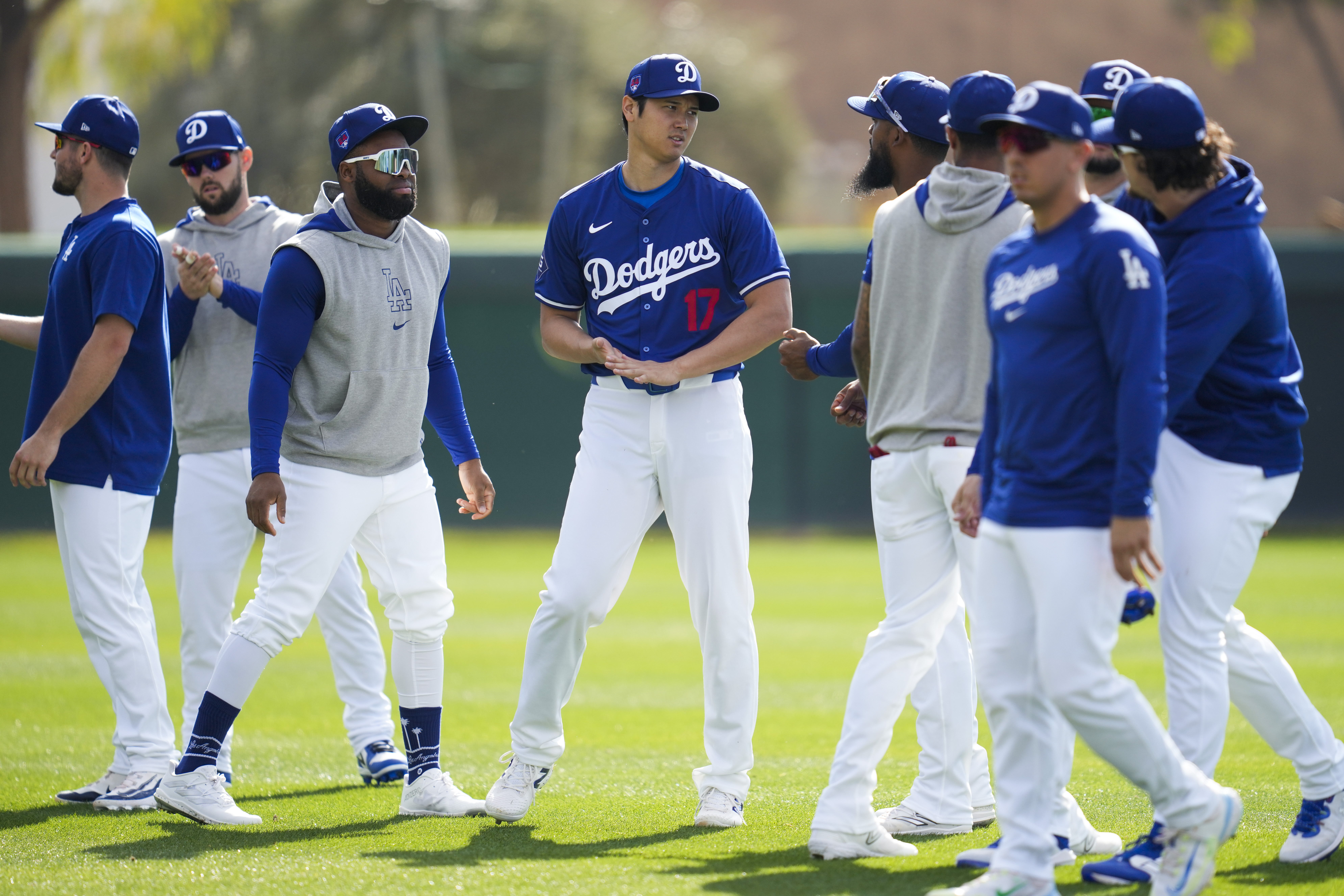 Los Angeles Dodgers designated hitter Shohei Ohtani (17) participates in spring training baseball workouts at Camelback Ranch in Phoenix, Sunday, Feb. 18, 2024.