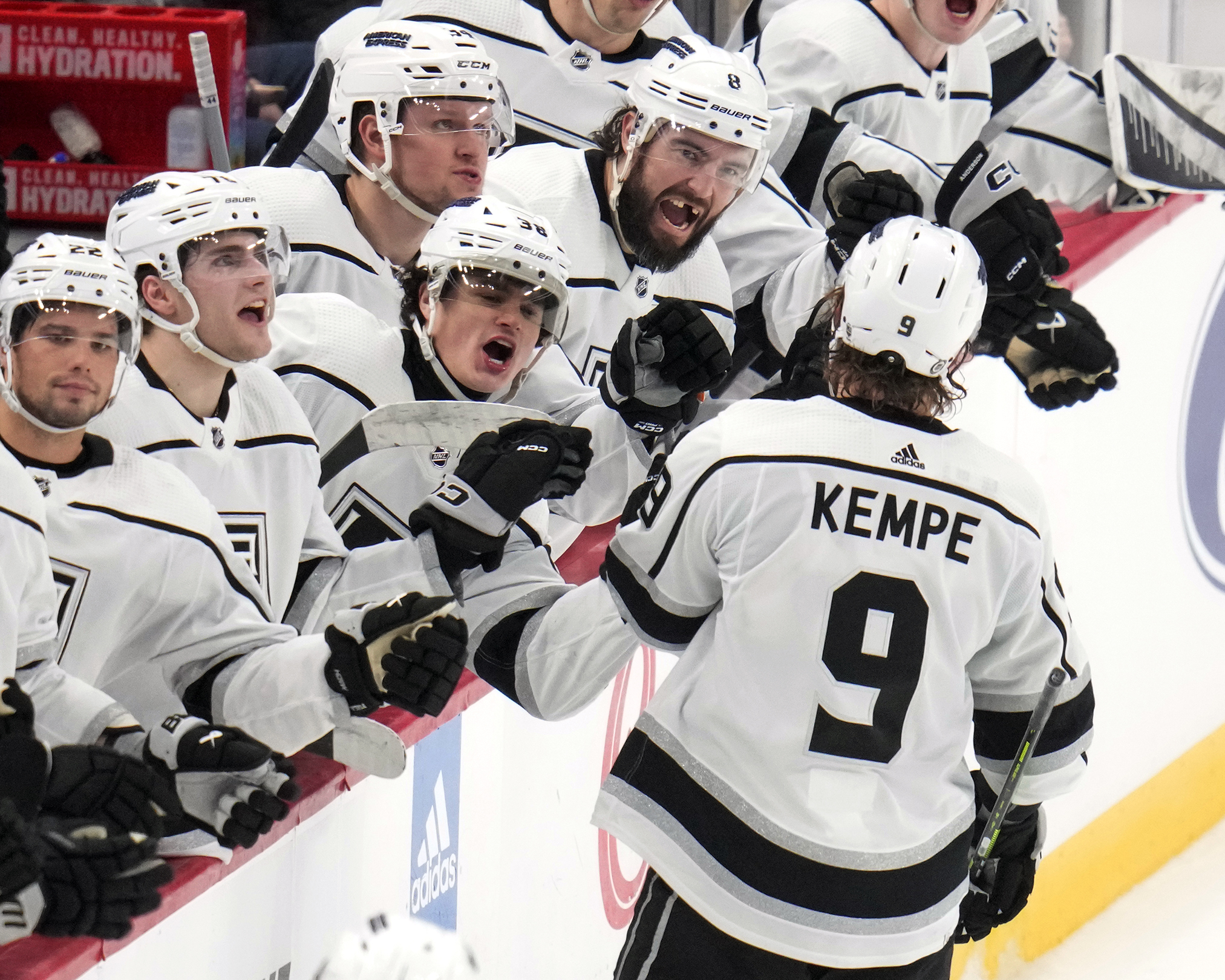 Los Angeles Kings' Adrian Kempe (9) returns to the bench after scoring his second goal of the third period during an NHL hockey game against the Pittsburgh Penguins in Pittsburgh, Sunday, Feb. 18, 2024. 