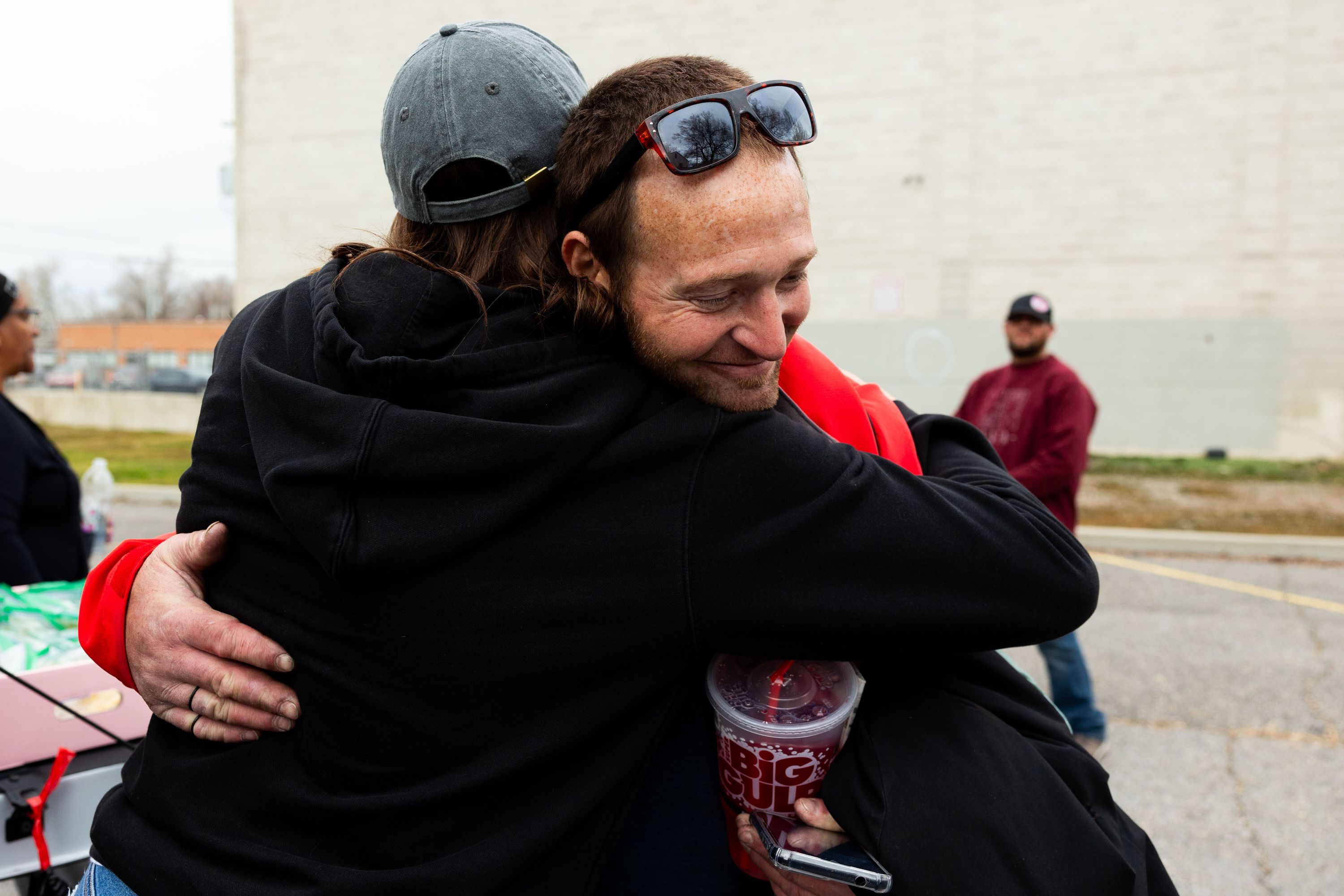 Jessica Lowe, founder of Be a Little Too Kind, hugs Matthew Andrus Hunter, one of her homies, in Salt Lake City on Feb. 1. Be a Little Too Kind is a nonprofit organization focused on assisting those experiencing homelessness by providing a homemade meal every week and other essential life-sustaining items.