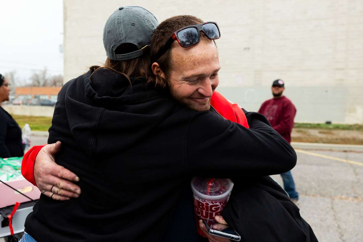 Jessica Lowe, founder of Be a Little Too Kind, hugs Matthew Andrus Hunter, one of her homies, in Salt Lake City on Feb. 1. Be a Little Too Kind is a nonprofit organization focused on assisting those experiencing homelessness by providing a homemade meal every week and other essential life-sustaining items.