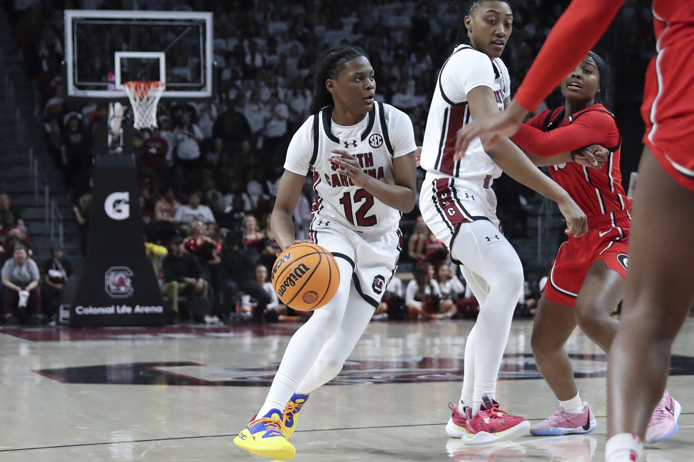 South Carolina guard MiLaysia Fulwiley (12) looks for a path to the basket during the second half of an NCAA college basketball game against Georgia, Sunday, Feb. 18, 2024, in Columbia, S.C. 