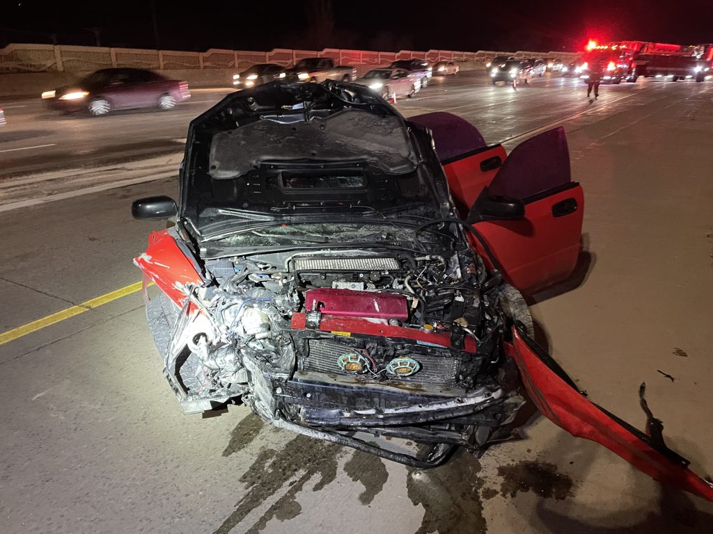 A race between two vehicles on I-15 near Provo Saturday evening ended when one lost control and crashed into two cement barriers, injuring a 4-year-old girl.