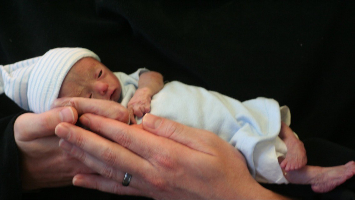 Women who have lost their own babies create unique clothing for the babies of grieving parents
