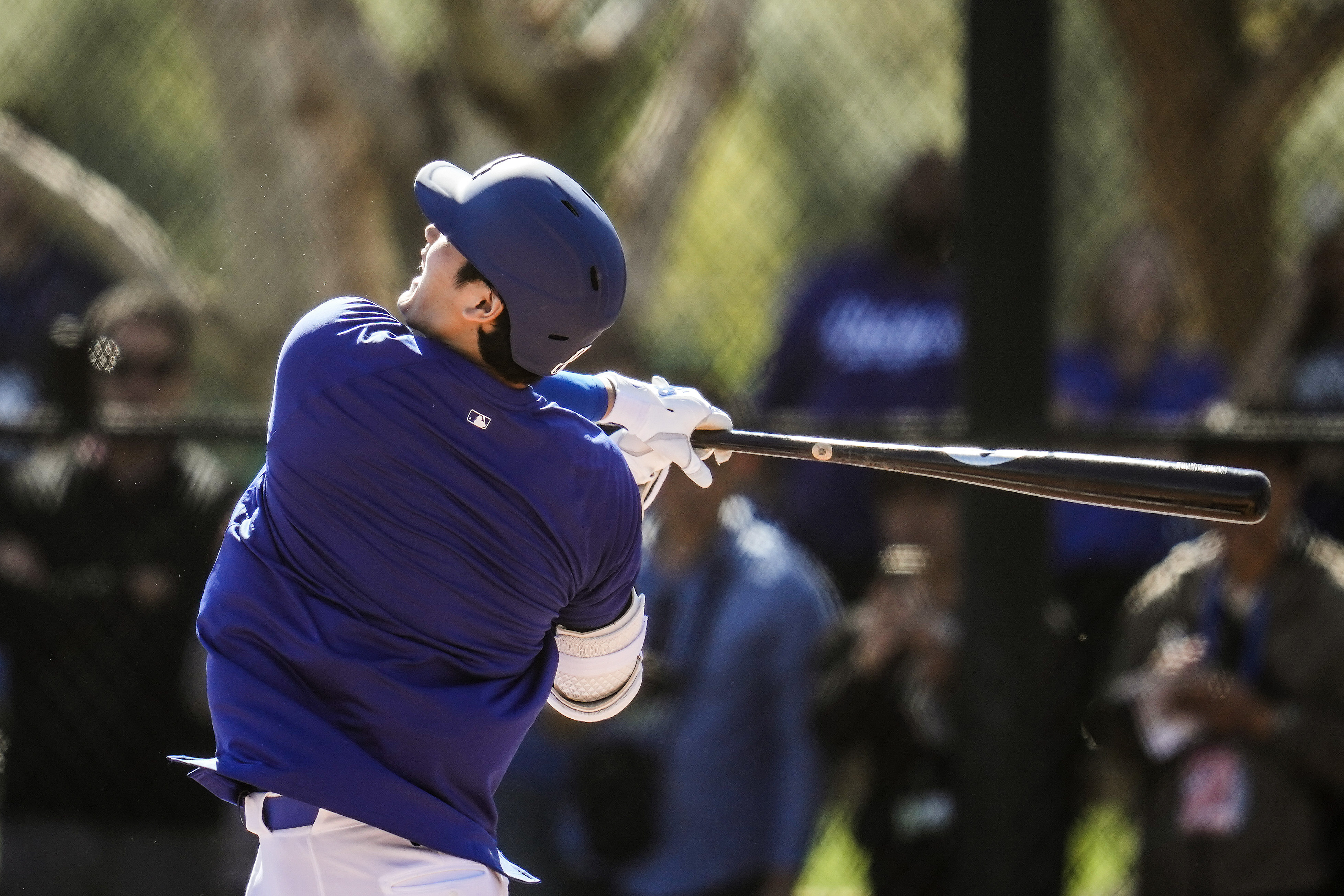 Los Angeles Dodgers designated hitter Shohei Ohtani participates in spring training baseball workouts at Camelback Ranch in Phoenix, Monday, Feb. 19, 2024. 