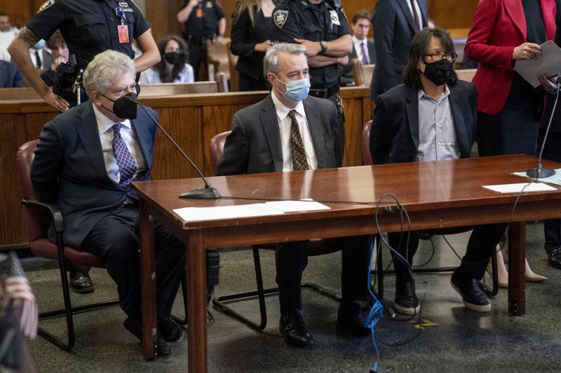 From left, Glenn Horowitz, Craig Inciardi and Edward Kosinski appear in criminal court after being indicted for conspiracy involving handwritten notes from the famous Eagles album "Hotel California," July 12, 2022, in New York. On Wednesday, an unusual criminal trial is set to open over the handwritten lyrics.