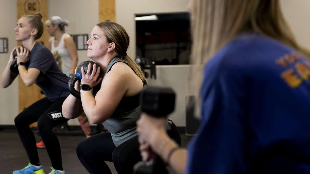 Jody Reid, a mother of three who reversed her Type 2 diabetes through exercise and diet, participates in a fitness class at Roy CrossFit in Roy on Nov. 9, 2022.