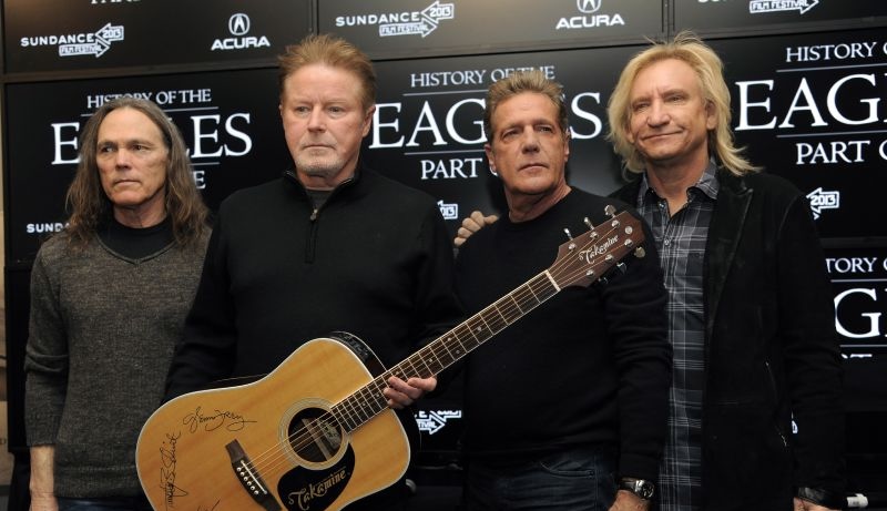 Members of The Eagles, from left, Timothy B. Schmit, Don Henley, Glenn Frey and Joe Walsh appear at the Sundance Film Festival, Jan. 19, 2013, in Park City. Three people are charged with conspiring to own and try to sell manuscripts of "Hotel California" lyrics.