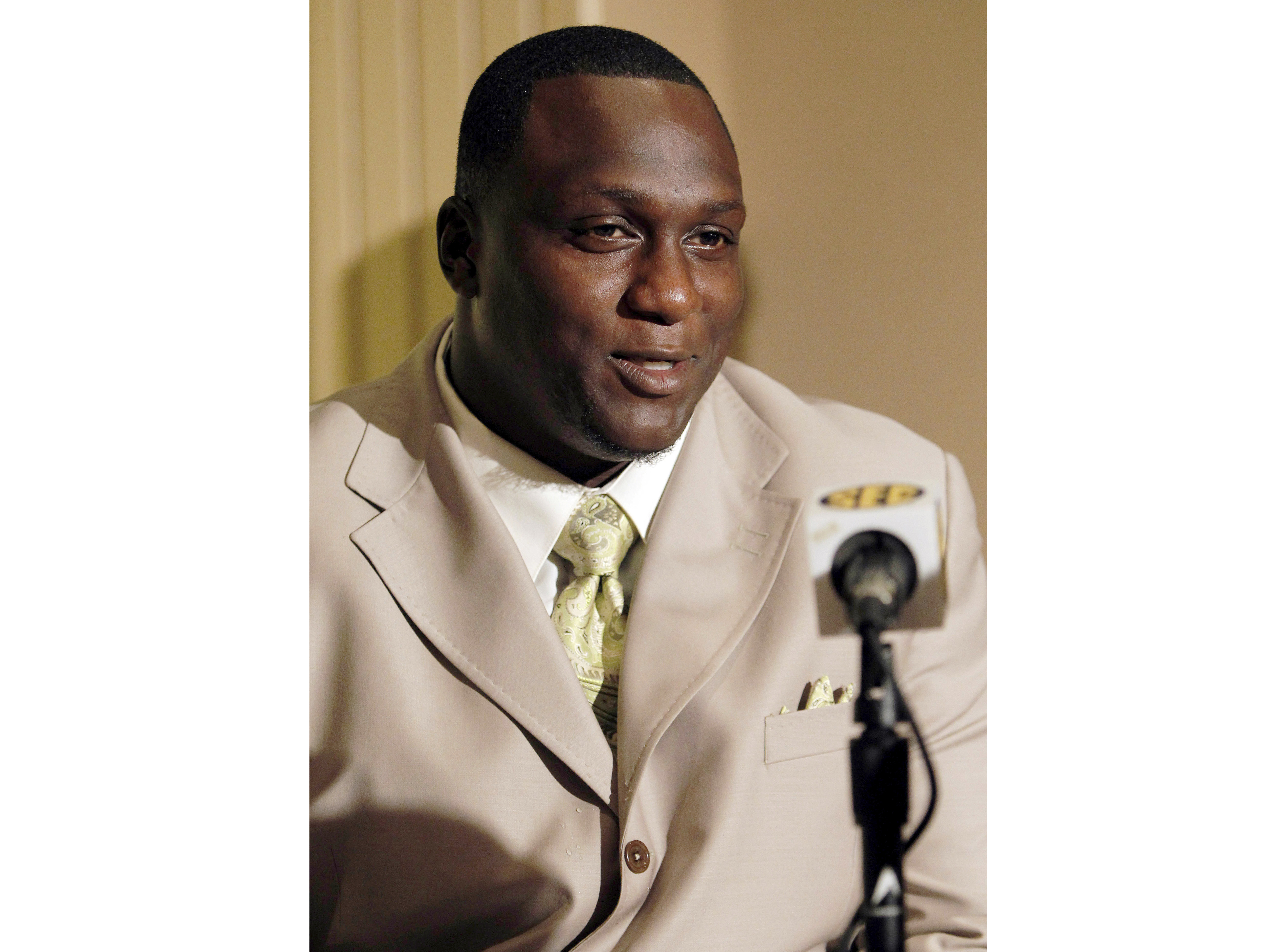FILE - Mississippi defensive tackle Jerrell Powe talks to the media during the Southeastern Conference football media days on Friday, July 23, 2010, in Hoover, Ala. Powe's attorney, Tom Fortner, said on Monday, Feb. 19, 2024, that a Mississippi grand jury has declined to indict Powe on a kidnapping charge, months after Powe, who played three seasons for the NFL's Kansas City Chiefs and one season for the Houston Texans, was arrested. 