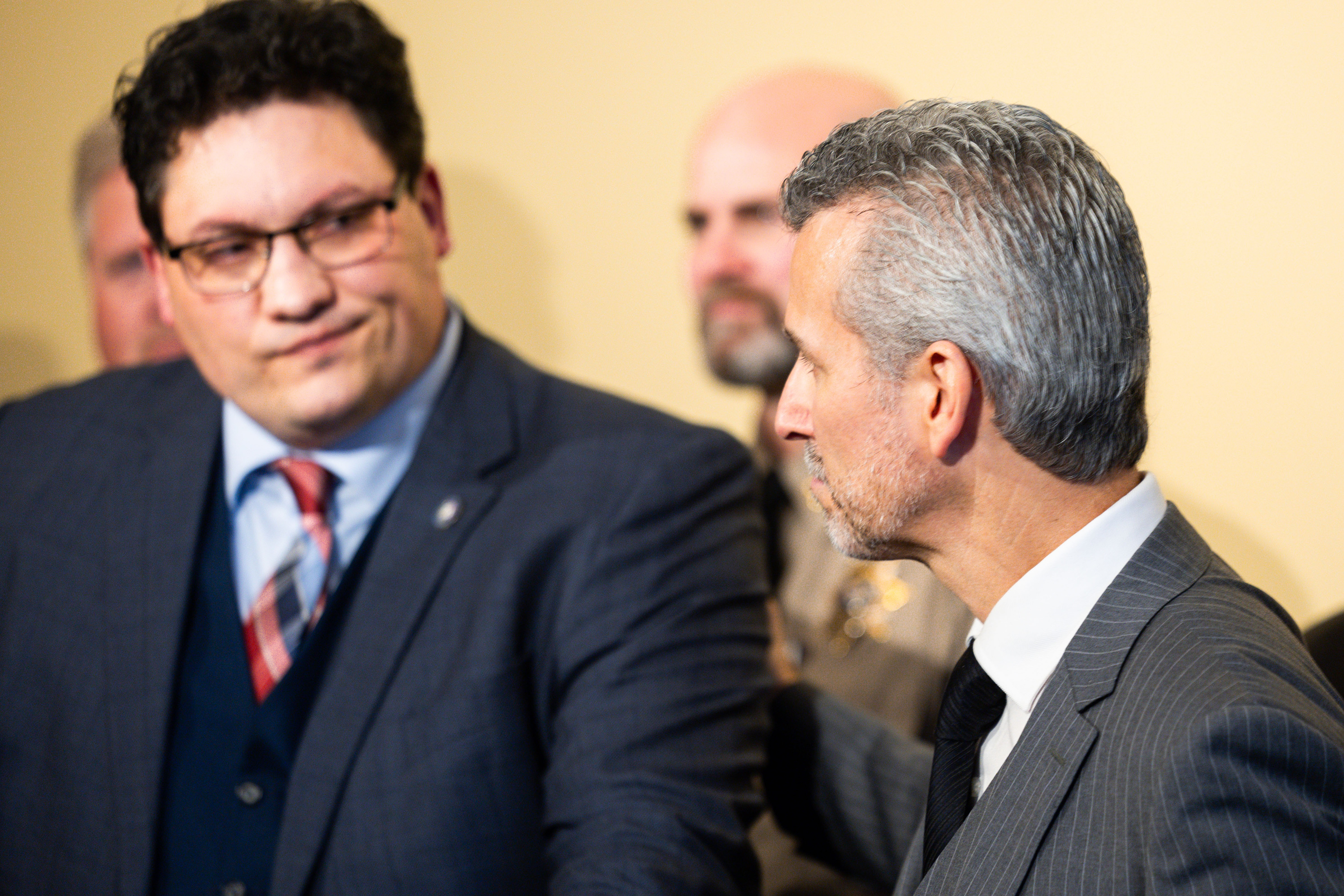 Max Schachter, founder of Safe Schools For Alex and father of Parkland, Florida, school shooting victim Alex Schachter, puts his hand on Rep. Ryan Wilcox, R-Ogden, while discussing the School Security Task Force at the Capitol in Salt Lake City Tuesday.