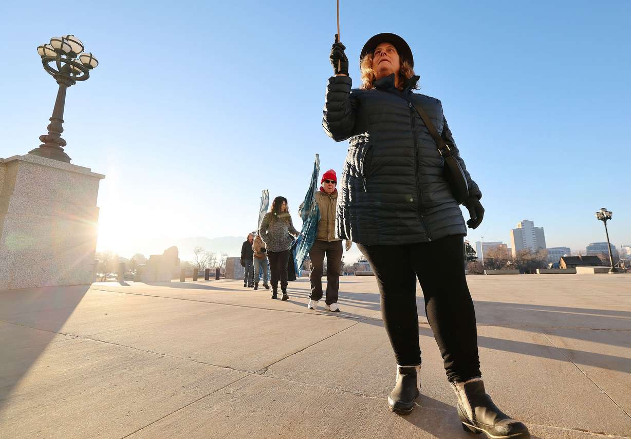 Nan Seymour and members of the Great Salt Lake vigil group walk the grounds of the Capitol in Salt Lake City on Jan. 30. The group walks around the grounds every morning as part of the vigil.