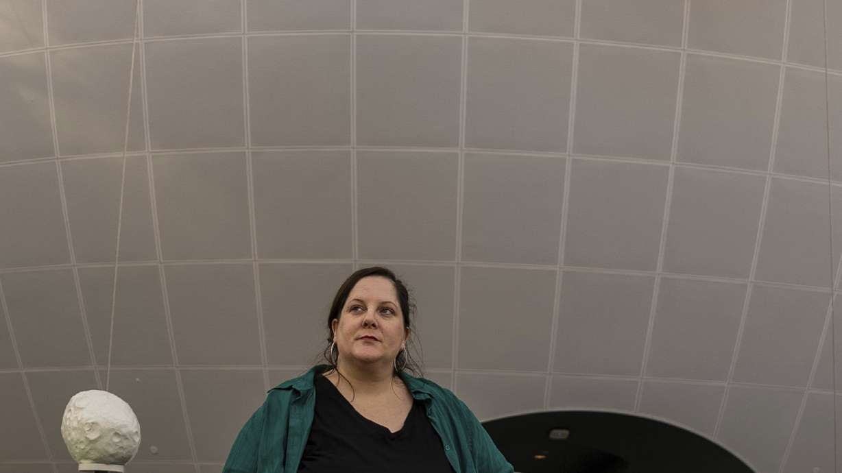 Emily Hollenbeck stands for a portrait in New York on Jan. 12. Hollenbeck lived with a deep, recurring depression she likened to a black hole.