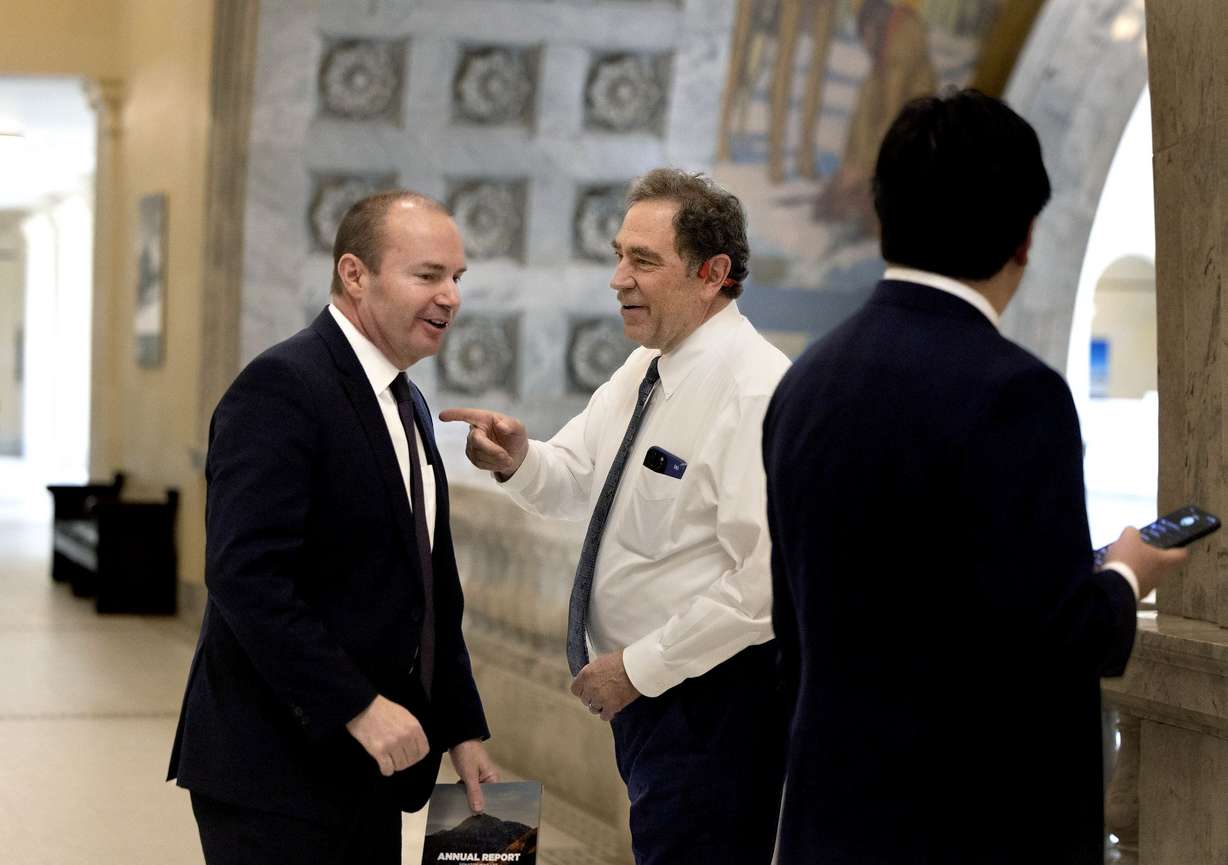 U.S. Sen. Mike Lee, R-Utah, speaks to Rep. Brian King, D-Salt Lake City, at the Capitol in Salt Lake City on Wednesday.