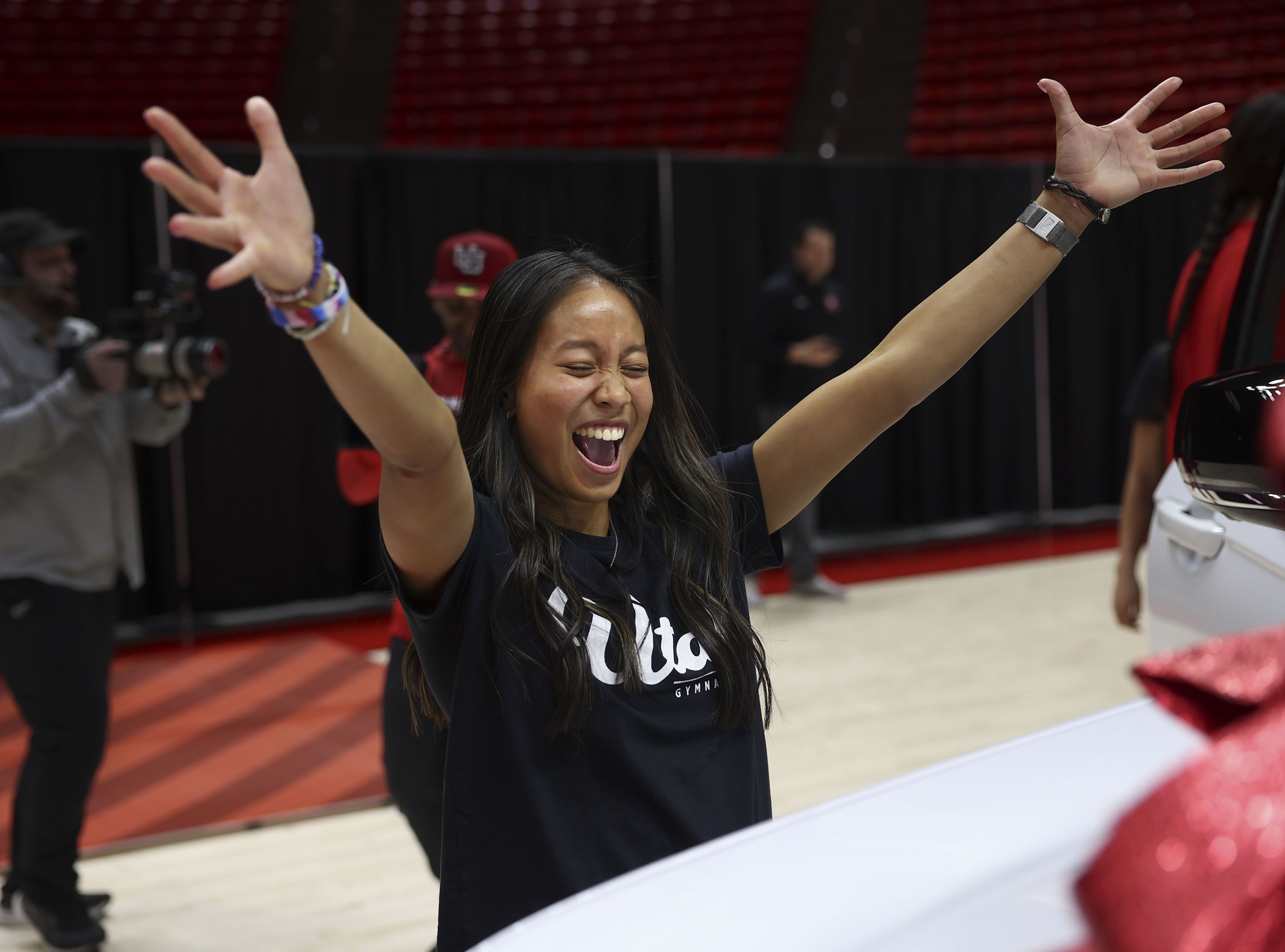 Gymnast Alani Sabado celebrates a vehicle lease deal as part of a name, image and likeness package in Salt Lake City on Dec. 13, 2023. A committee advanced Utah's attempt to regulate college athletes' use of their name, image and likeness. 